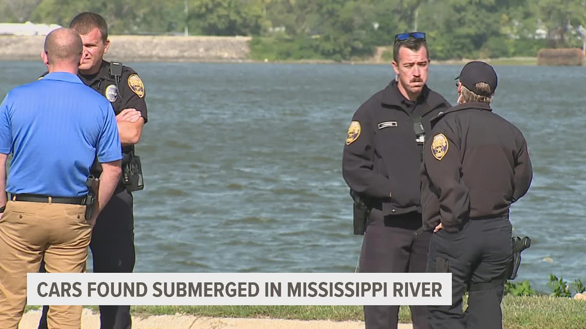 The submerged cars were found near the 55th street boat ramp along Butterworth Parkway. Police say the cars have been submerged for many years.