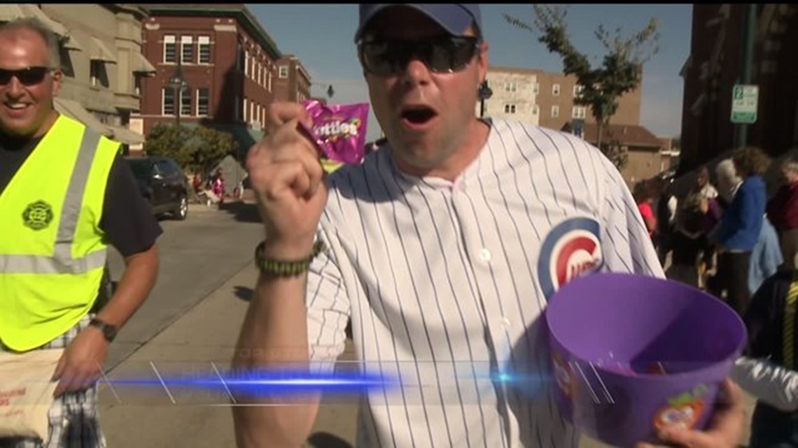 Local Cubs fans celebrate the big “W”during Moline’s Halloween Parade