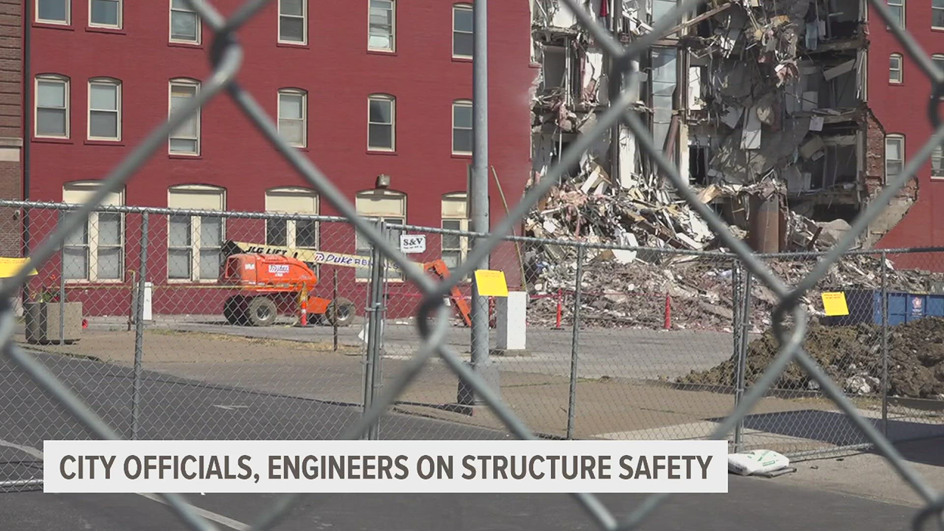 The city of Davenport held a 10 a.m. press conference Tuesday, May 30 saying the building is still unsound and the pile of rubble is helping keep the structure up.