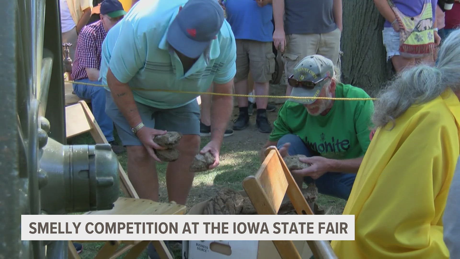 Contestants took turns finding a chuck-able cow chip and throwing it as far as they could.
