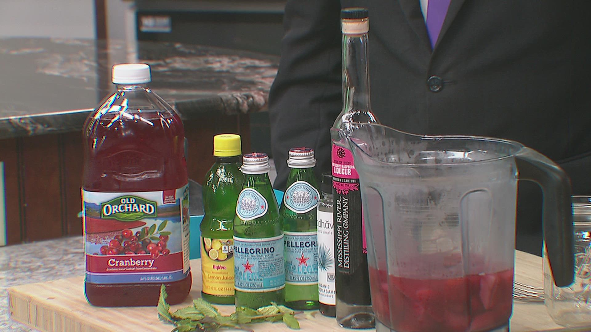 News 8's David Bohlman and Andrew Stutzke make strawberry spritzer on GMQC at 11 on Friday, June 17.