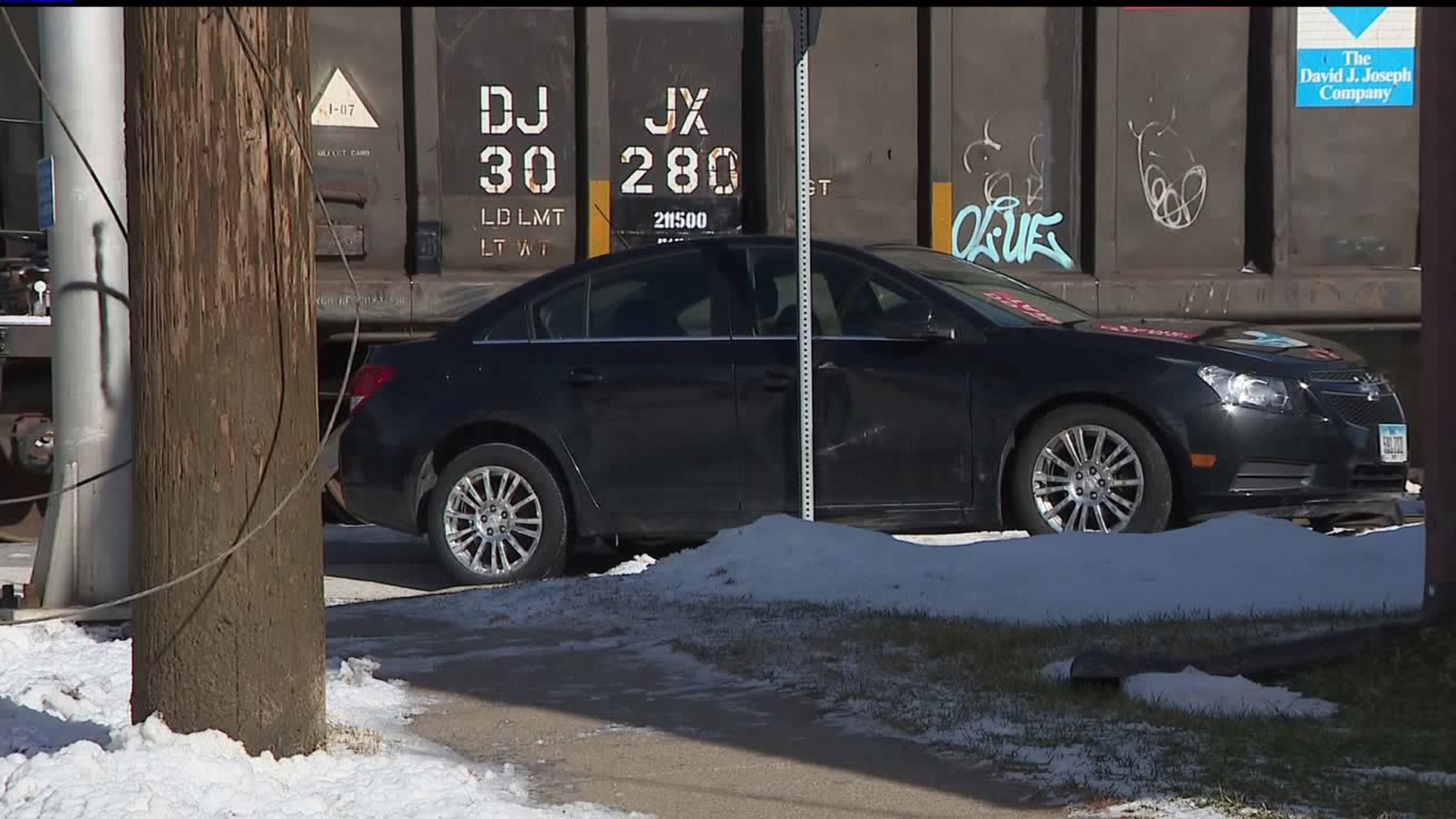 Car crashes trying to beat train
