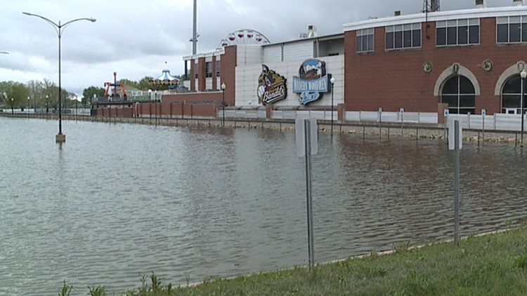 Quad Cities River Bandits first home game with stadium surrounded by flood water