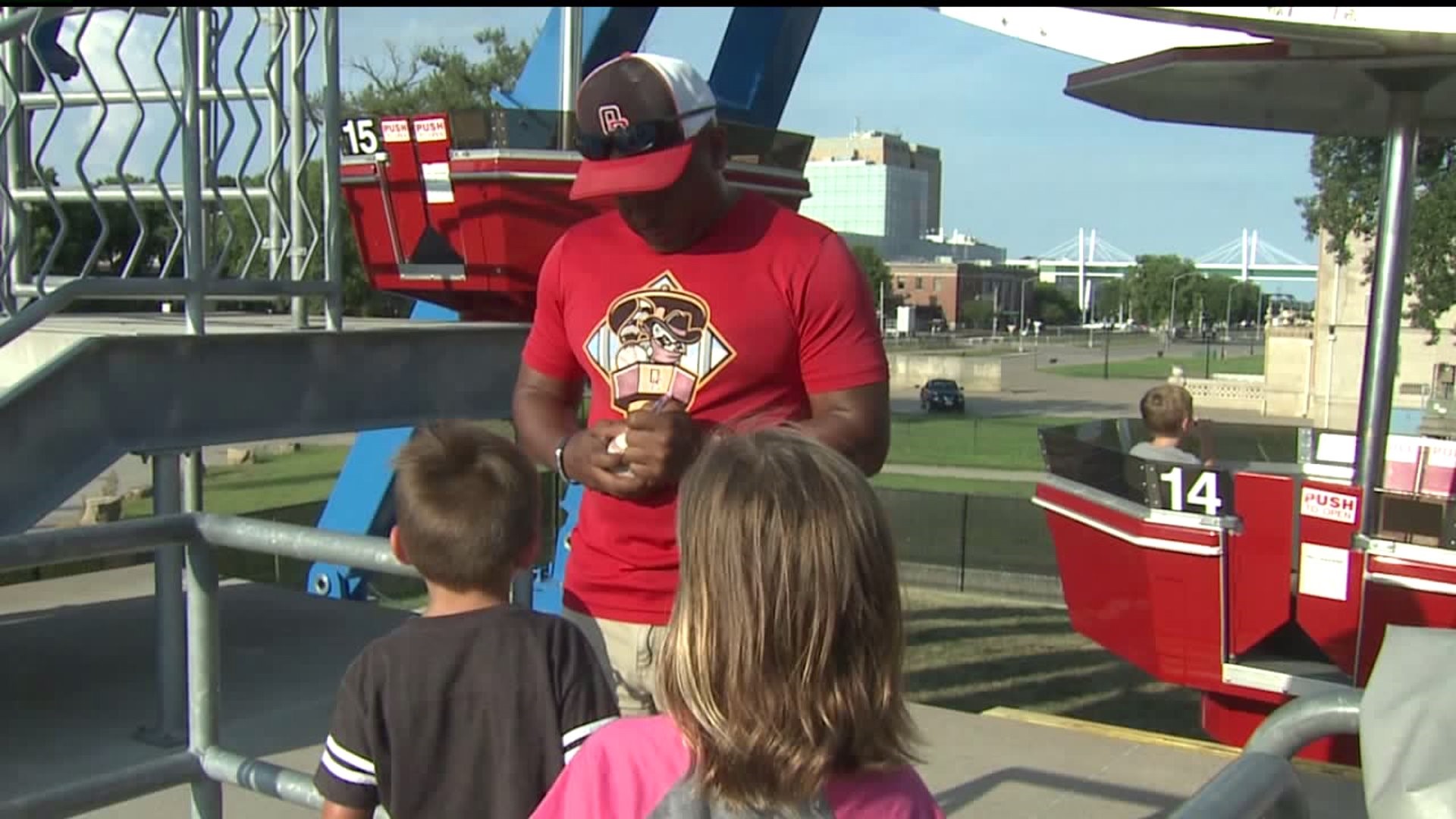 Kids get River Bandits employees to sign foul ball