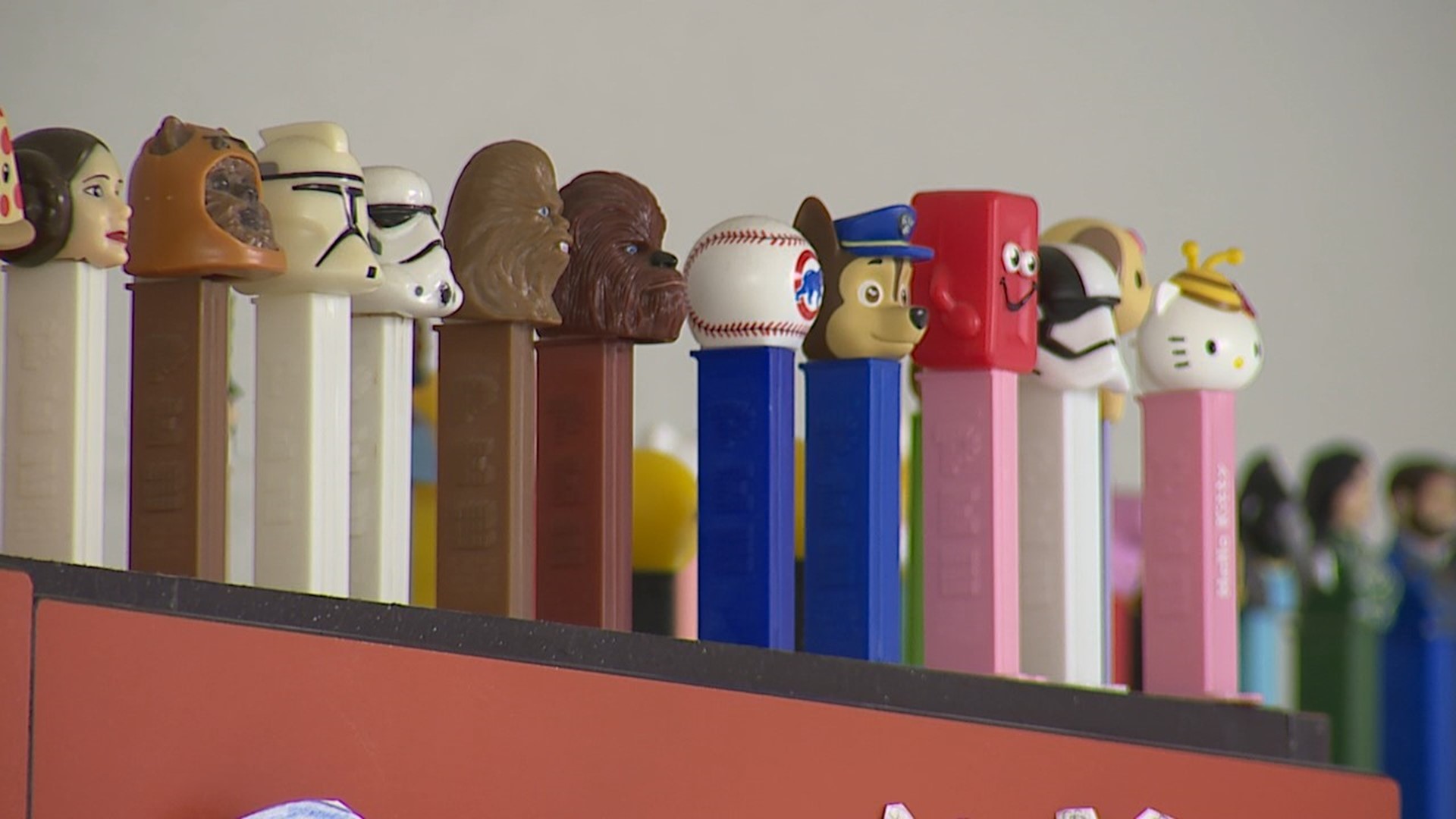 A third grade teacher has 638 PEZ dispensers in her classroom. Meanwhile the principal has 120 Mr. Potato Heads in his office.