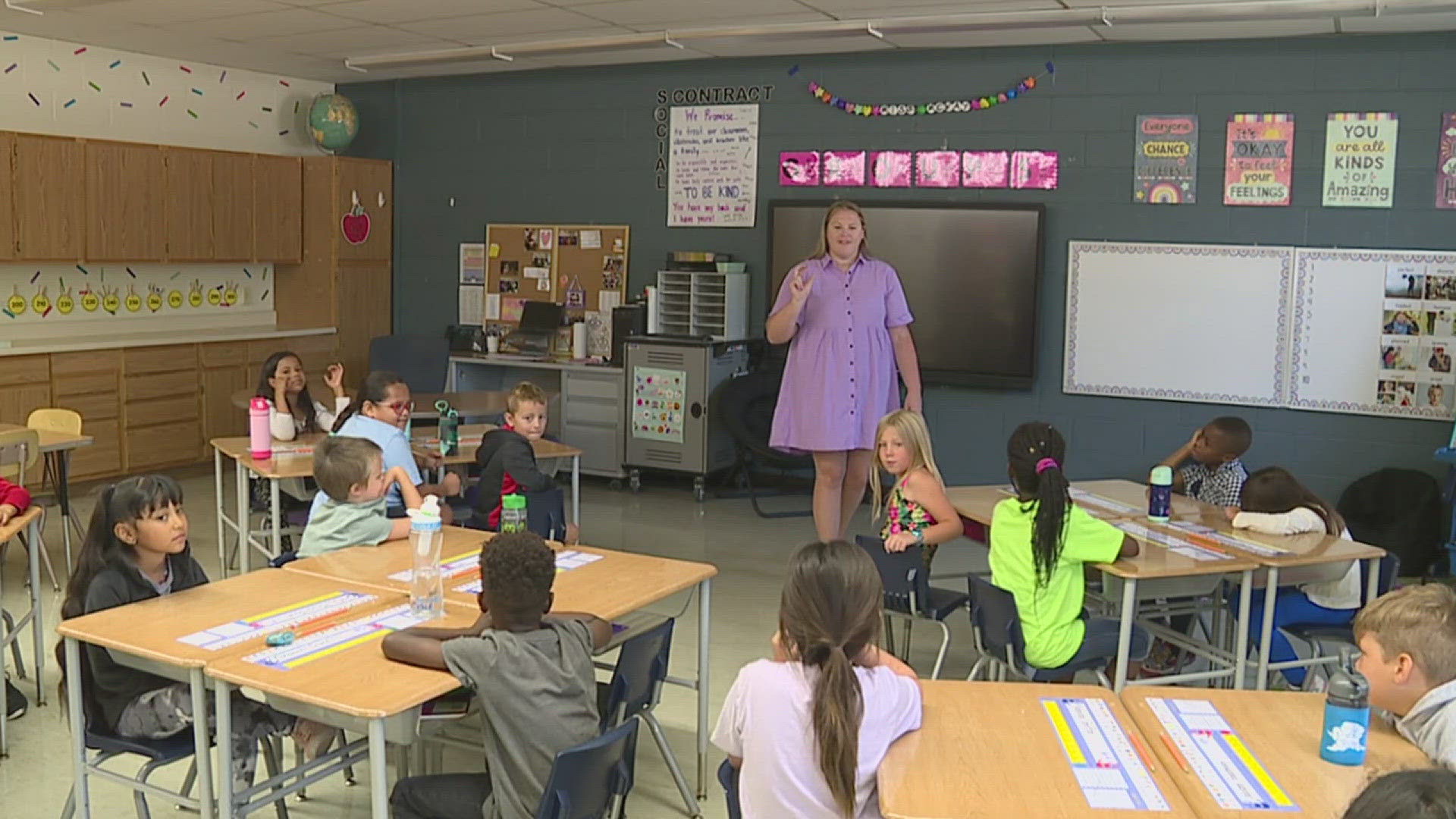 Elementary teacher Stacy Holland works alongside the Silvis Lions Club to help first and second grade students to support local literacy projects.