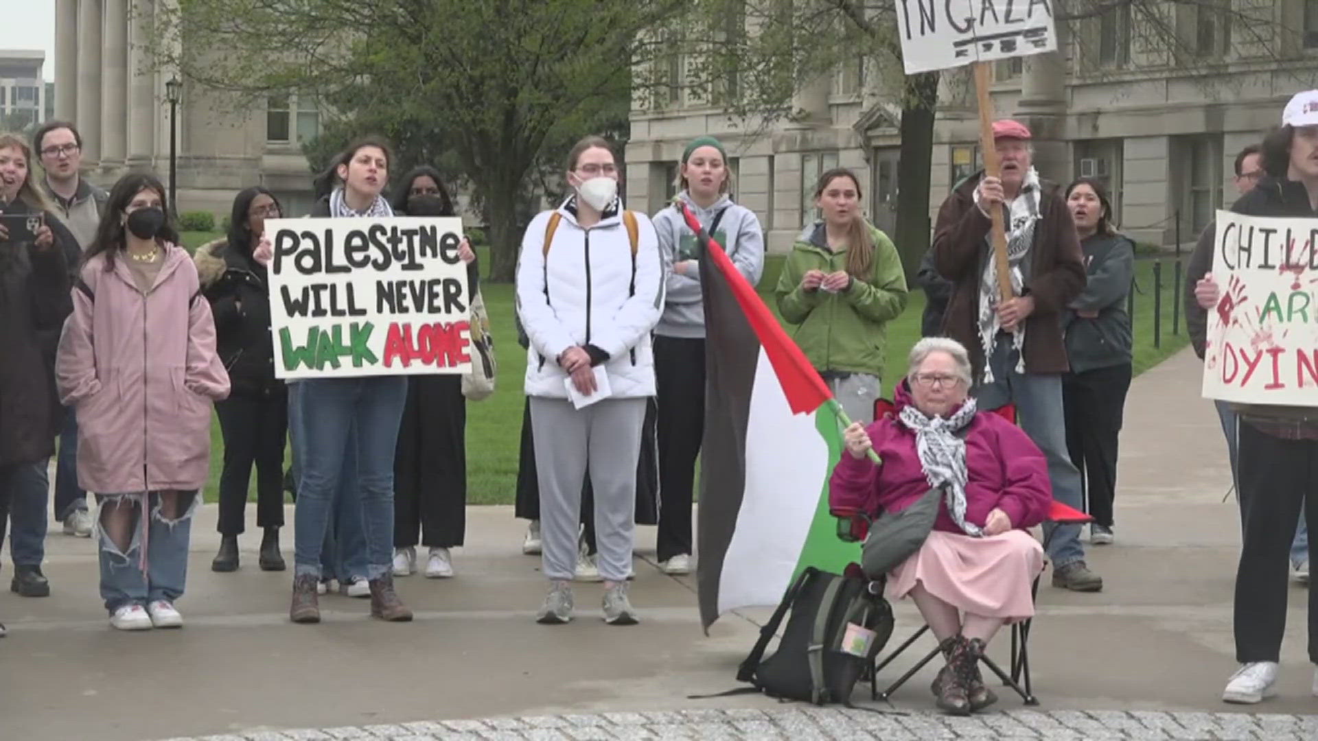 Protestors with the "Iowans for Palestine" and "Veterans for Peace" held a campus protest in Iowa City Friday.