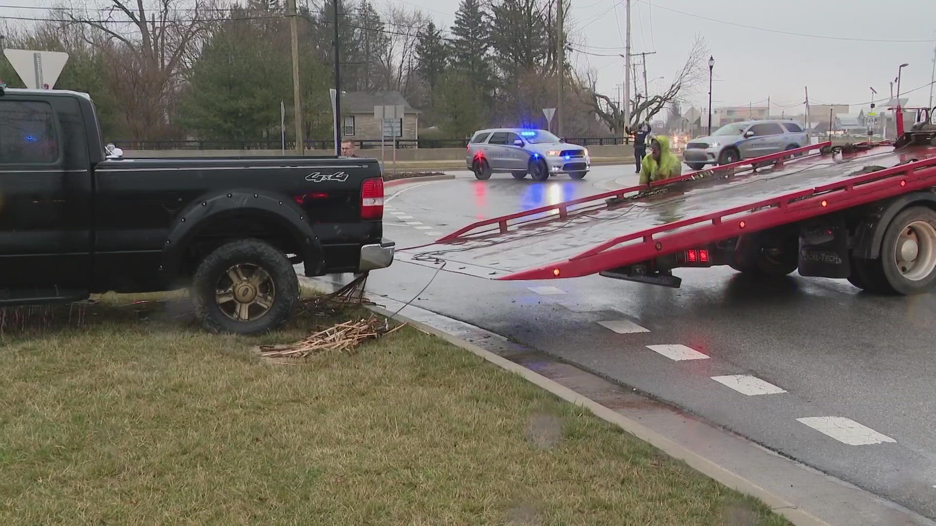 Bystanders pulled a mother and child out of the truck. Thankfully, they weren't hurt.