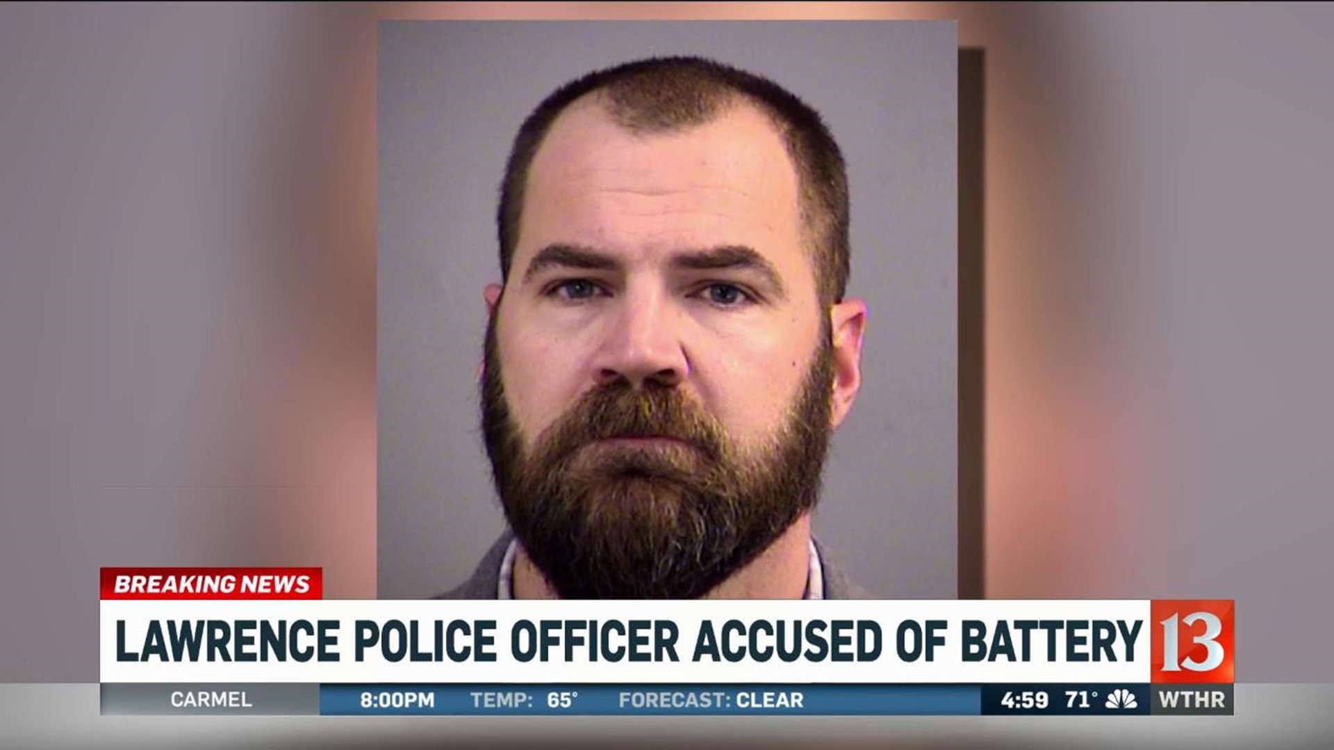 Lawrence police officer accused of battery