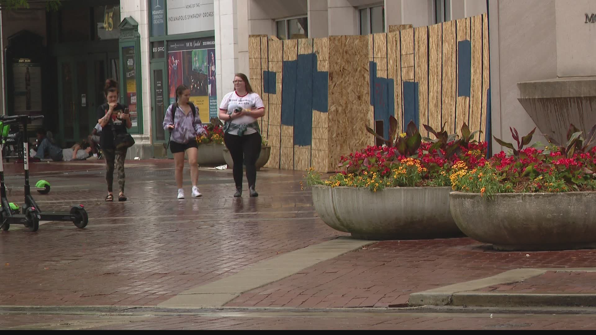 Downtown Indianapolis is reopening a few sheets of plywood at time.