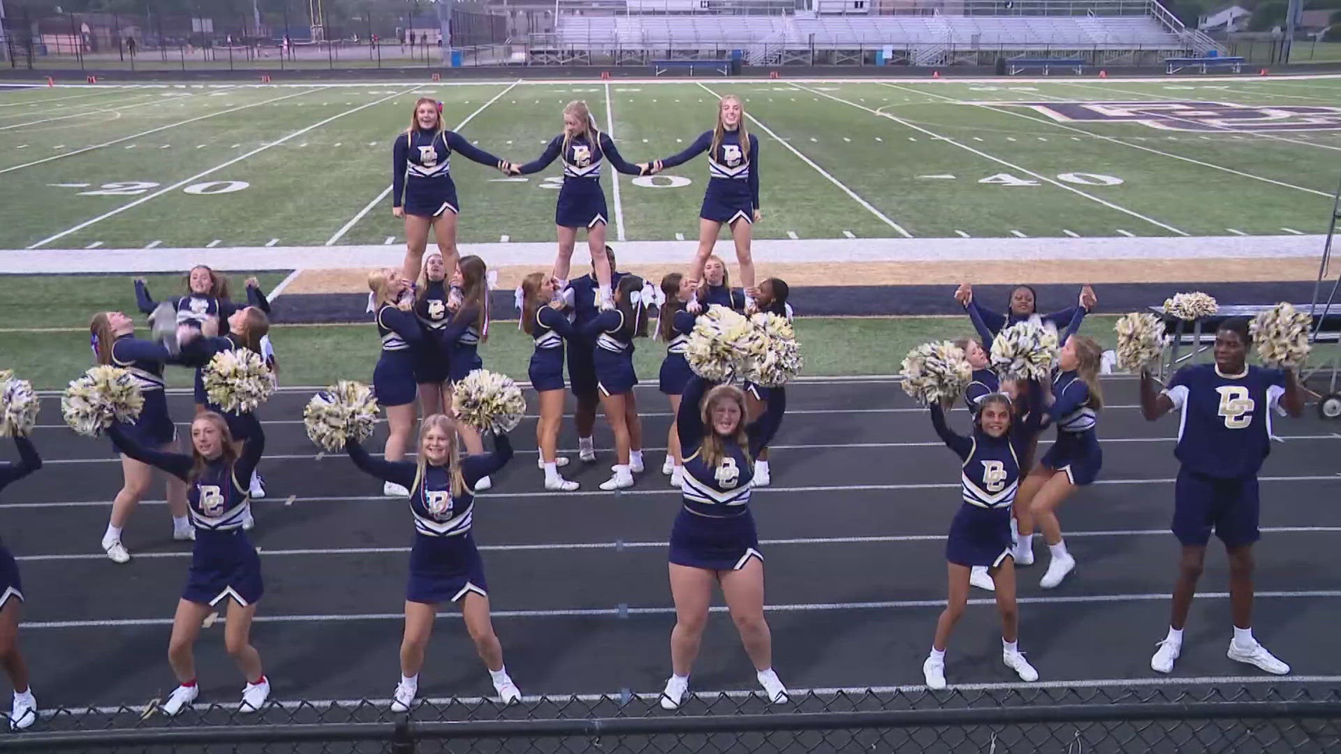 The Decatur Central cheerleaders perform as the Operation Football Cheerleaders of the Week.