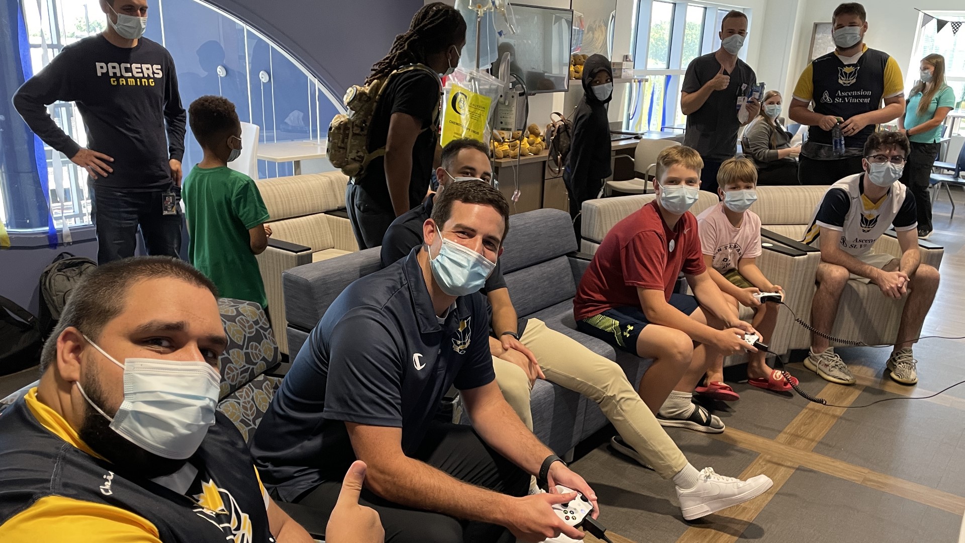 Just ahead of the league's 3v3 playoffs, members of the team took turns gaming with the kids and cheering each other on.