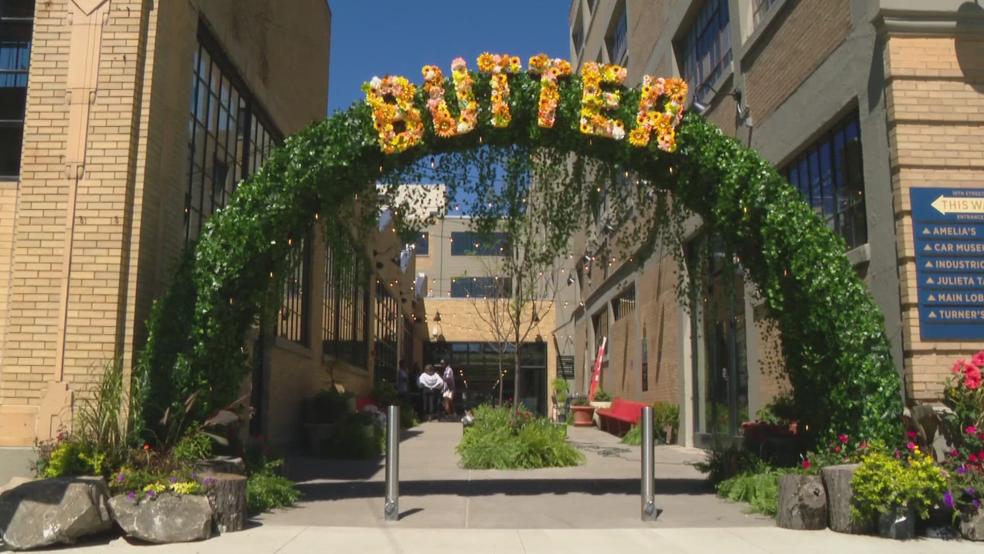 13News reporter Karen Campbell chats with local artists during the BUTTER art fair.