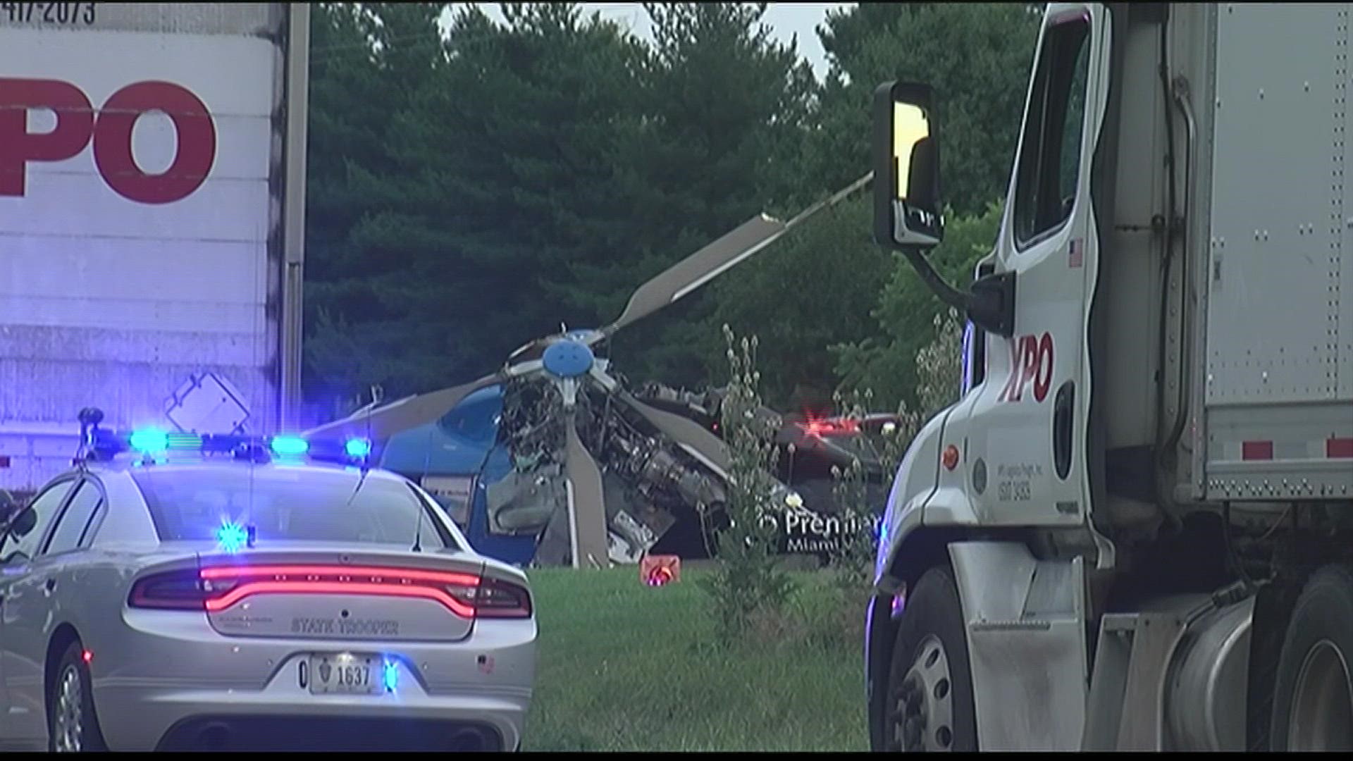 Authorities said a 69-year-old woman from Richmond, Indiana, was pronounced dead at the scene of the vehicle accident that the helicopter was responding to.