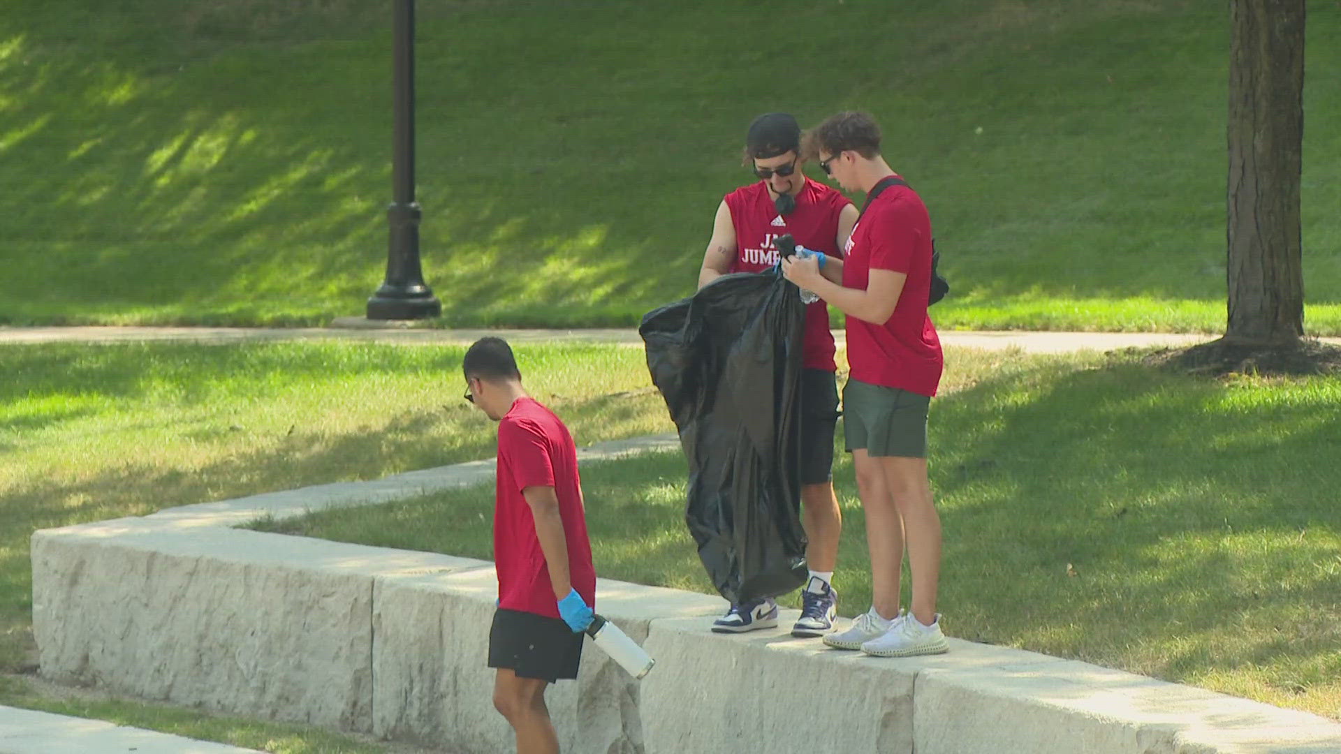 For the second year in a row, students and coaches came together picking up trash, mulching flower beds and pulling weeds to keep the downtown canal beautiful.