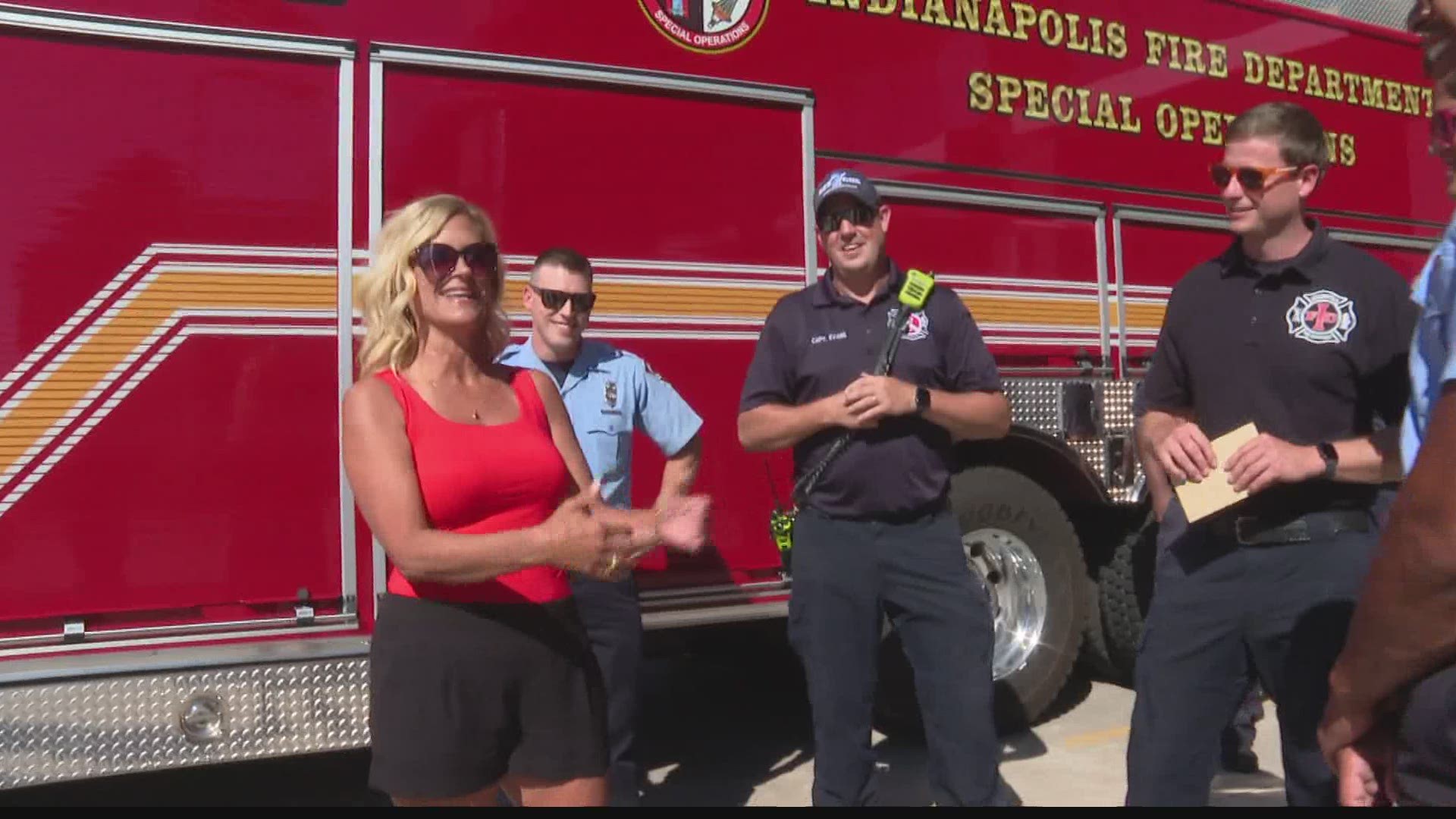 Amy Gillum brought chicken legs and other goodies to the IFD firefighters who found her prosthetic leg in Geist Reservoir.
