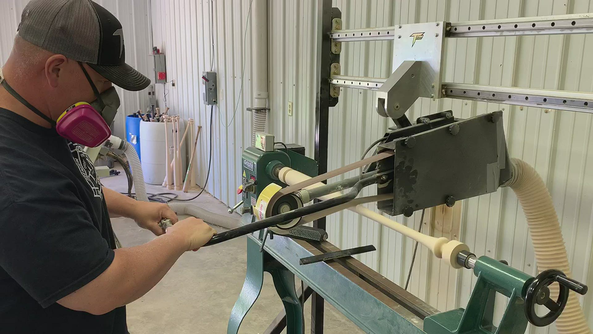 Trampas Young shows off how he makes a baseball bat in his Logansport shop.