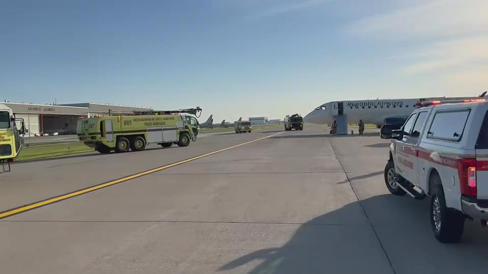 A passenger aboard Republic flight 4837 recorded video after the plane evacuated on the tarmac in Indianapolis.