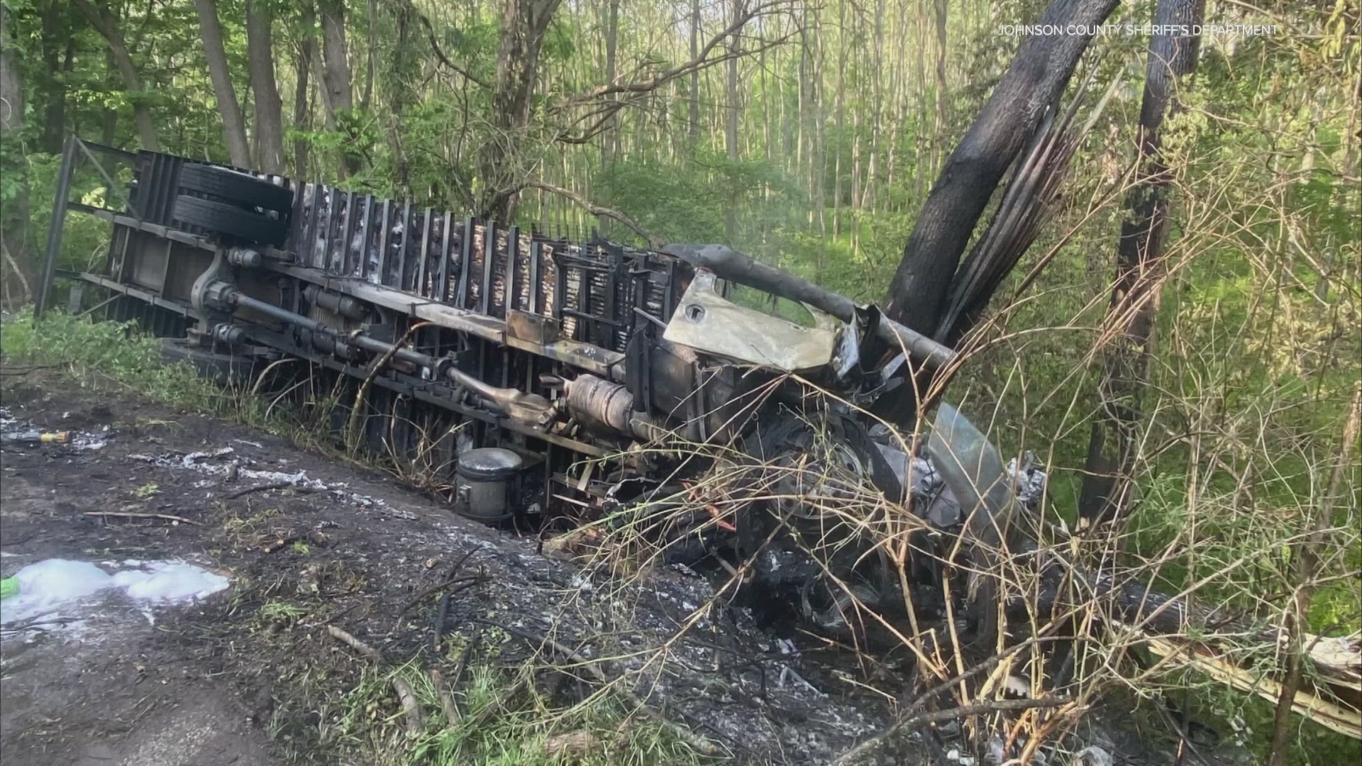 A truck went down an embankment and struck several trees, authorities said.