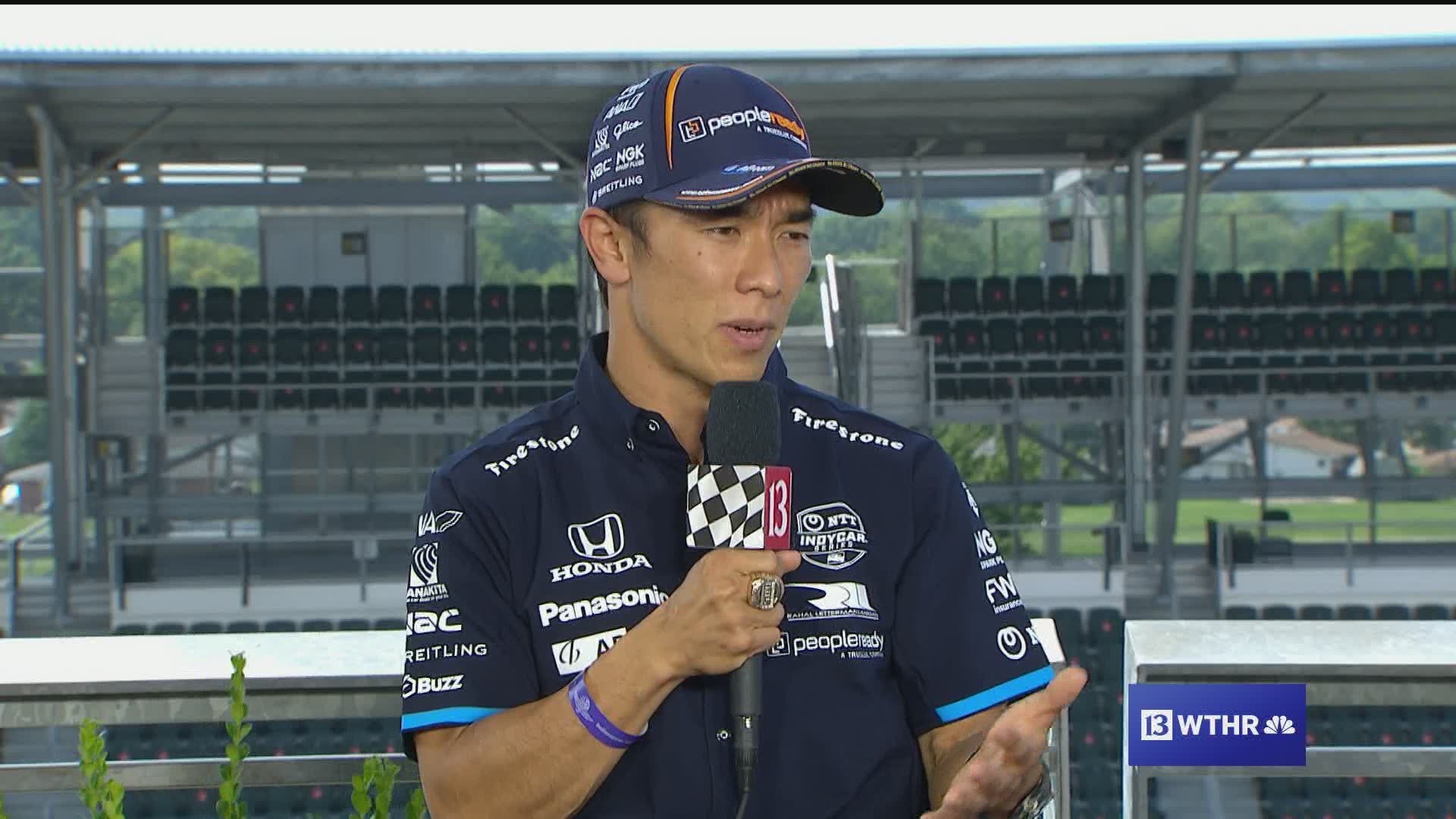 Indy 500 winner Takuma Sato talks with Dave Calabro at the Indianapolis 500 Victory Celebration.