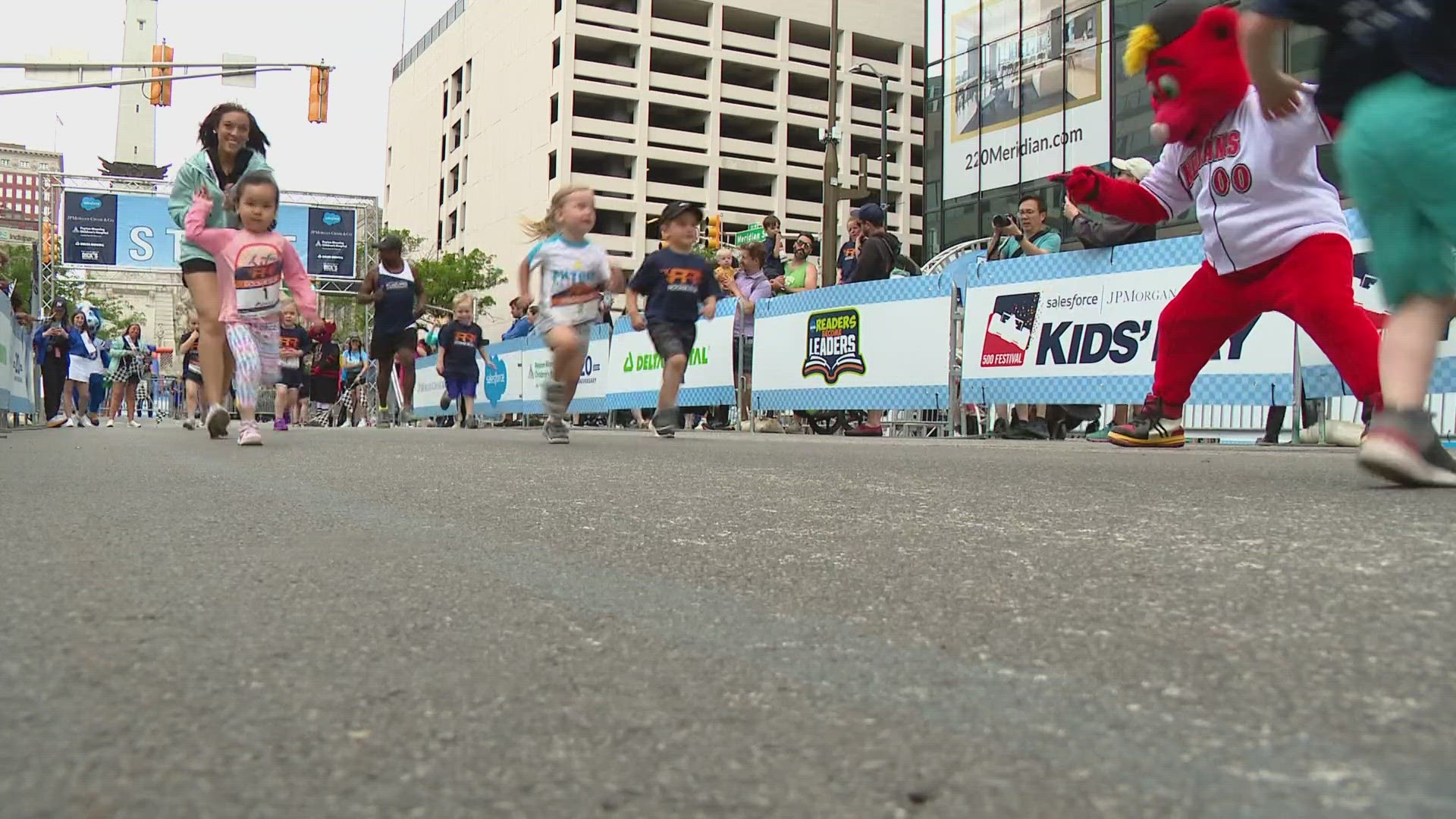 The event, which included 500 Festival Kids Day, brought thousands downtown Sunday.