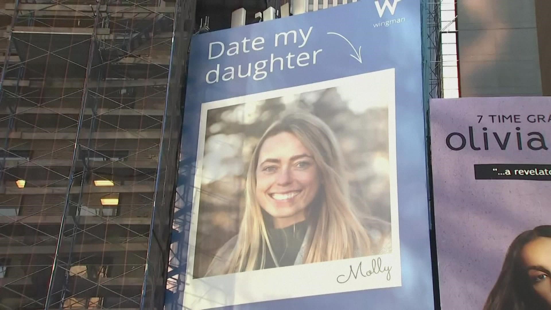 A photo of Molly Davis is larger than life in one of the world's busiest intersections - thanks to her mom.