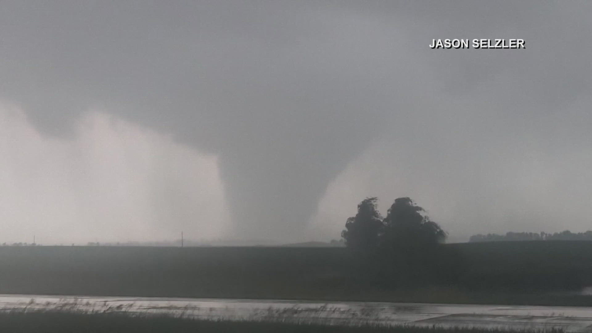Three people are dead and a regional airport was heavily damaged after powerful winds, including a tornado, swept across the upper Midwest.
