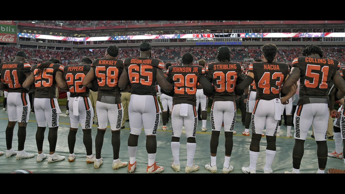 Browns players kneel in a circle during national anthem prior to