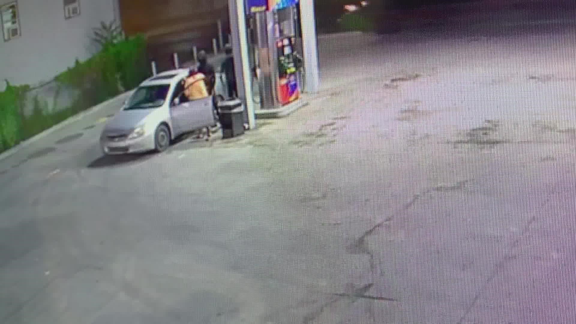 A woman suffered a gunshot wound during a carjacking at an Indianapolis gas station.