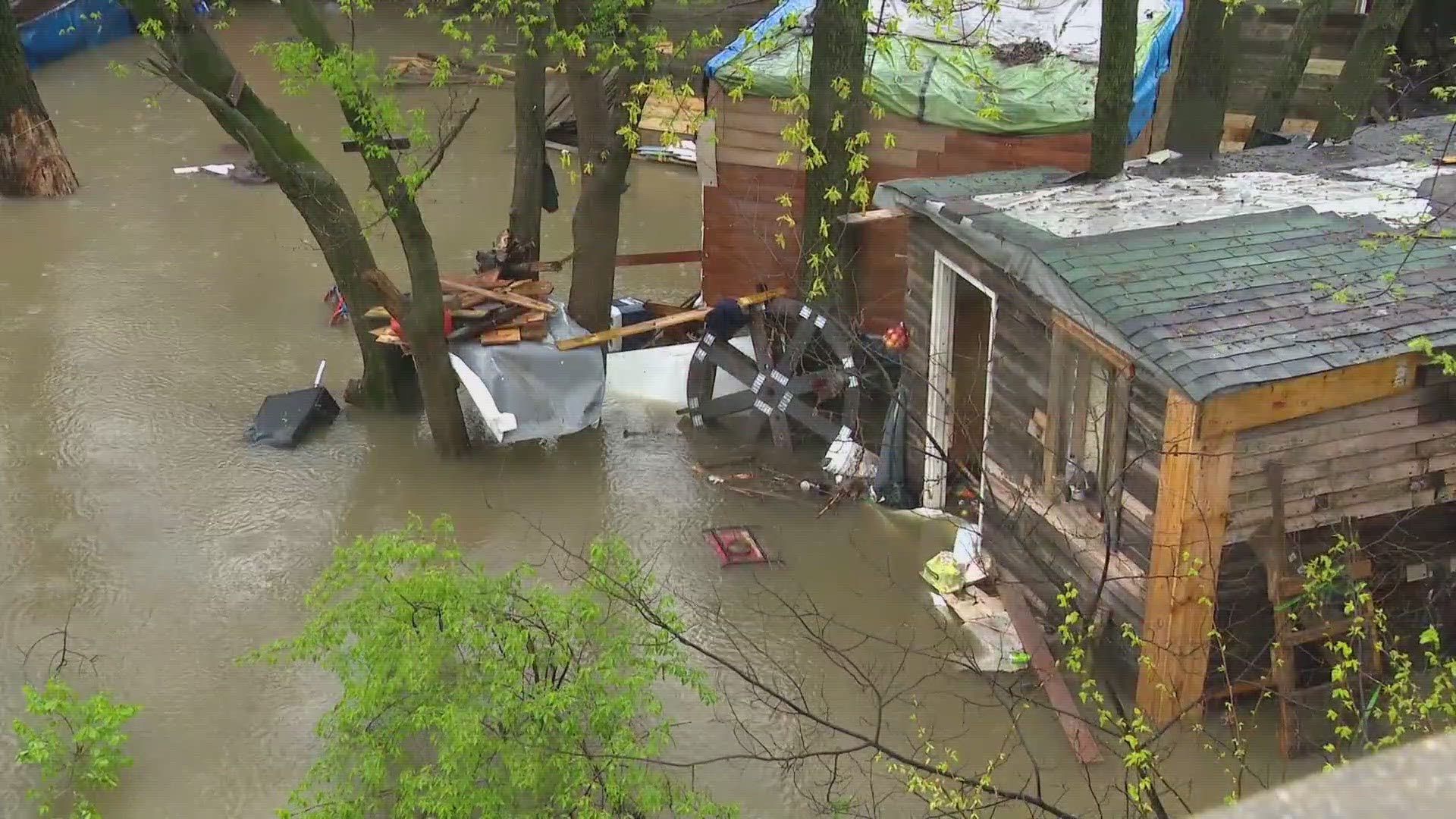 13News reporter Logan Gay reports from Eagle Creek, near Kentucky Ave and Raymond Street on Indy's southwest side where five people were rescued Thursday afternoon.