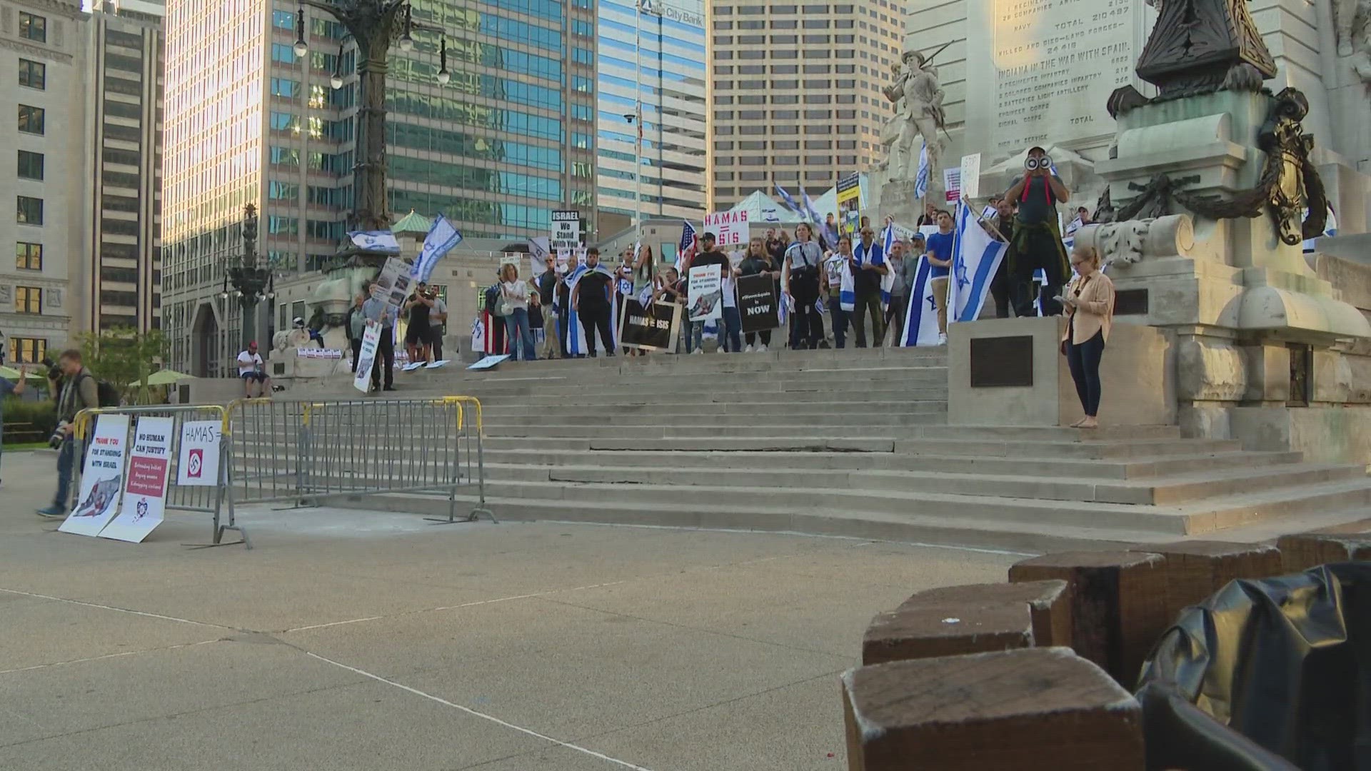 The demonstrations on Monument Circle Thursday drew hundreds of people.