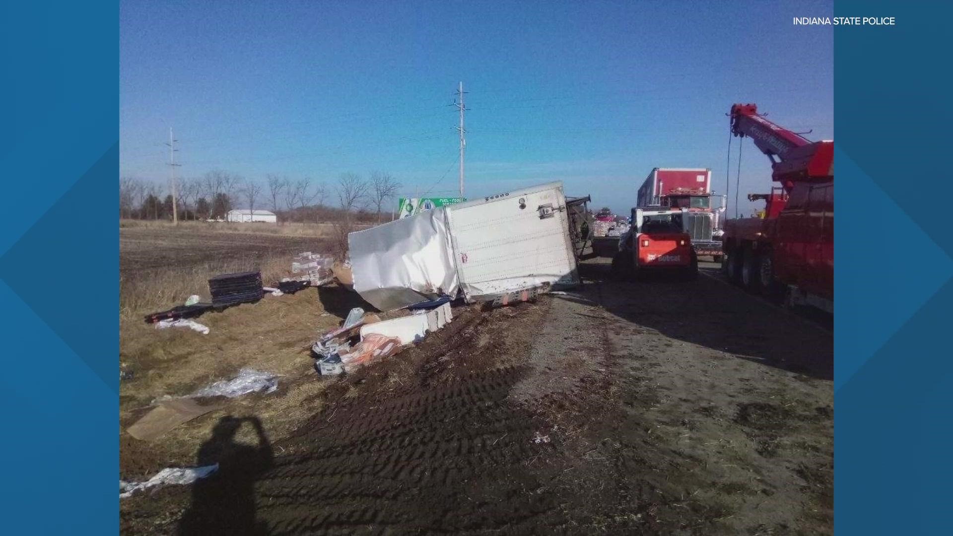 A semi driver was arrested after rolling his rig. 	Troopers say the driver had a "white, powdery substance."