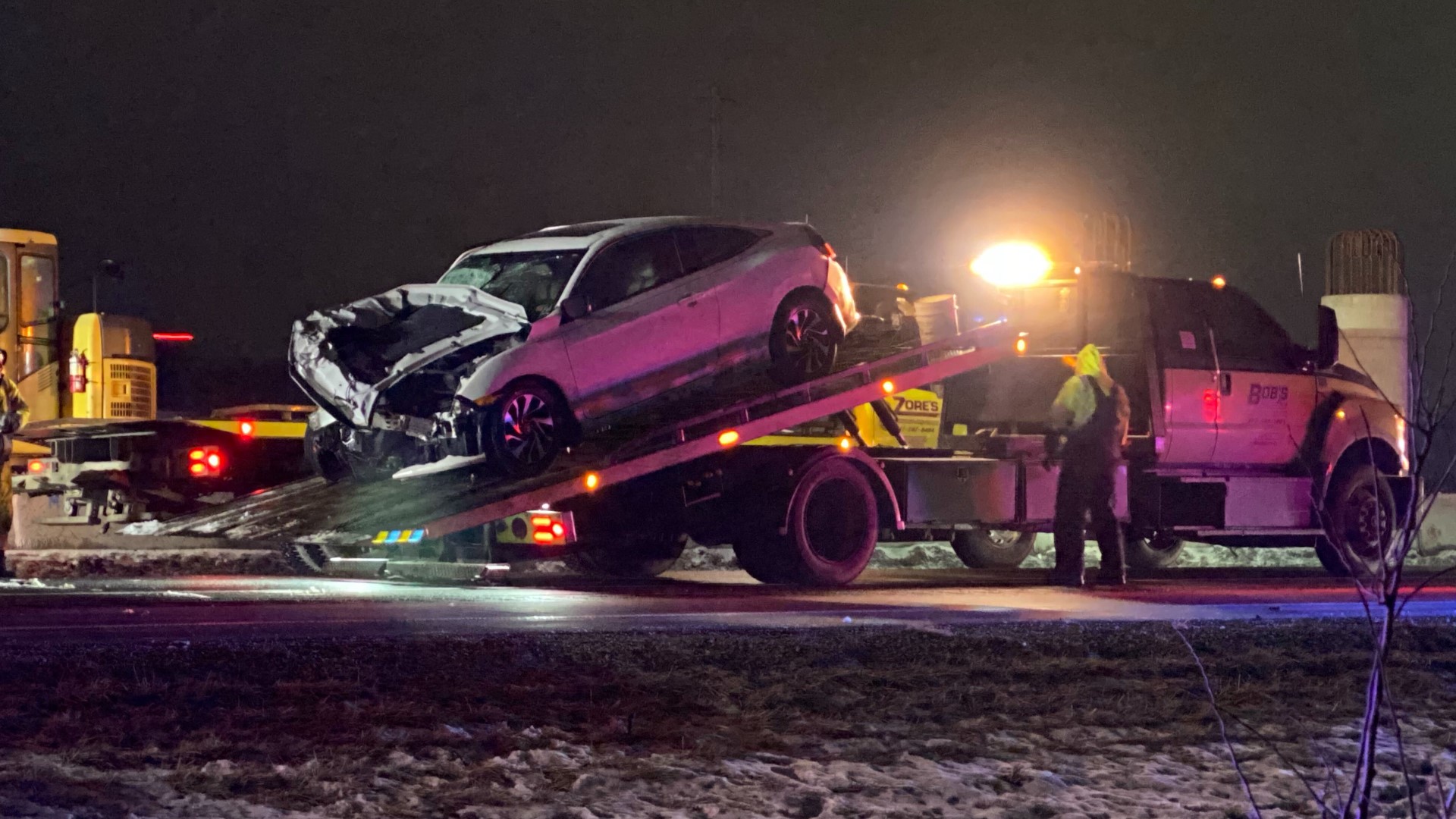 Three Whitestown officers were conducting a traffic stop when a white sedan struck one of the police vehicles, which then hit the other police vehicles at the scene.