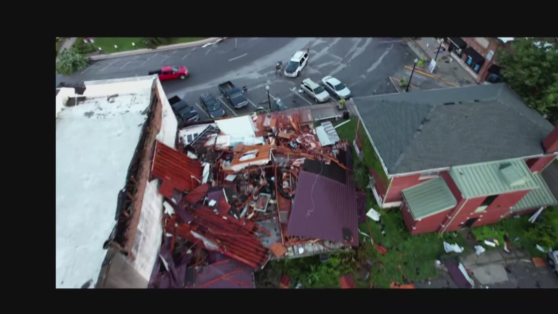 Roofs were torn off of buildings and power lines and trees down closed multiple roads according to the Orange County Sheriff's Office.