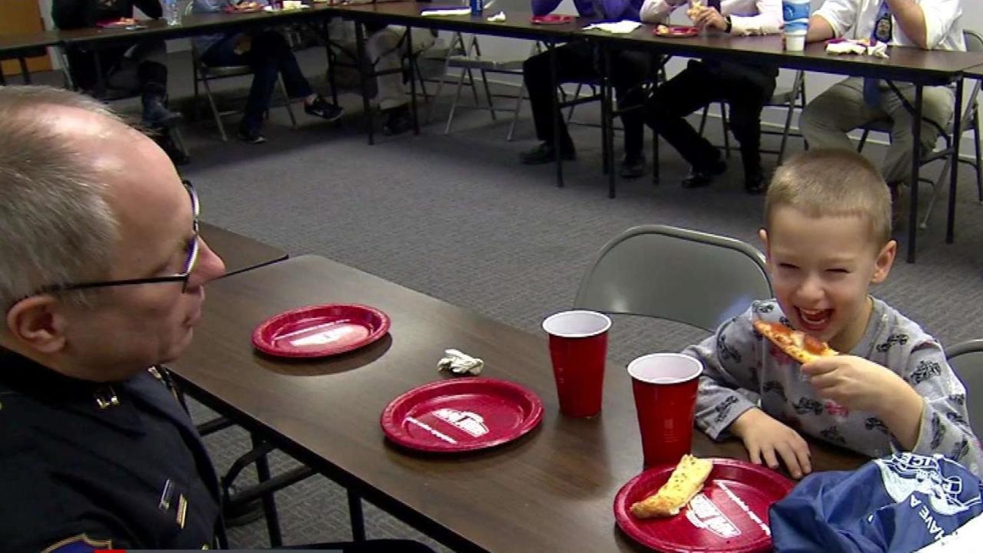Boy donates pizza party to police