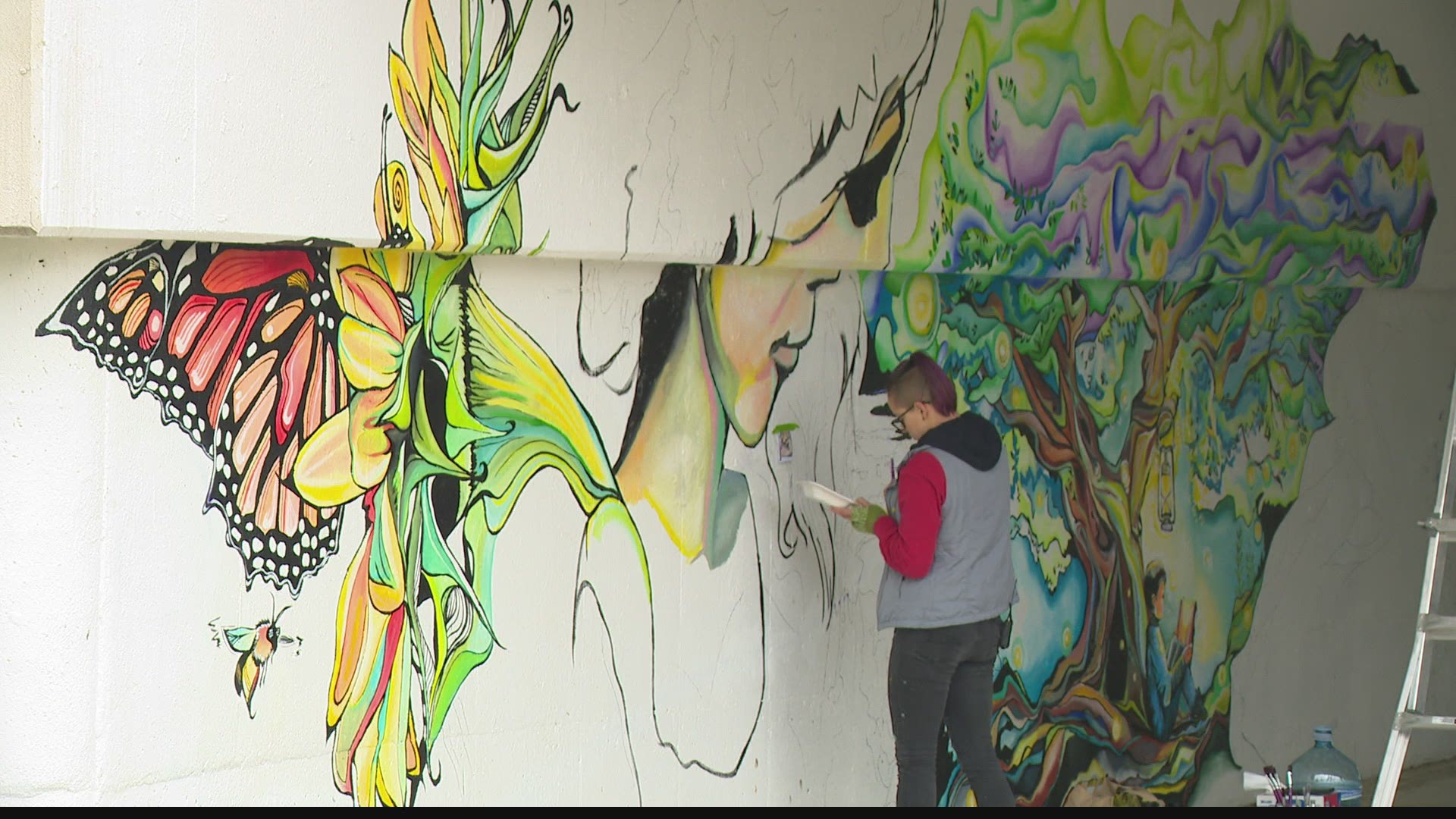 Meredith is introducing us to a muralist who's turning an underpass into a beautiful destination.