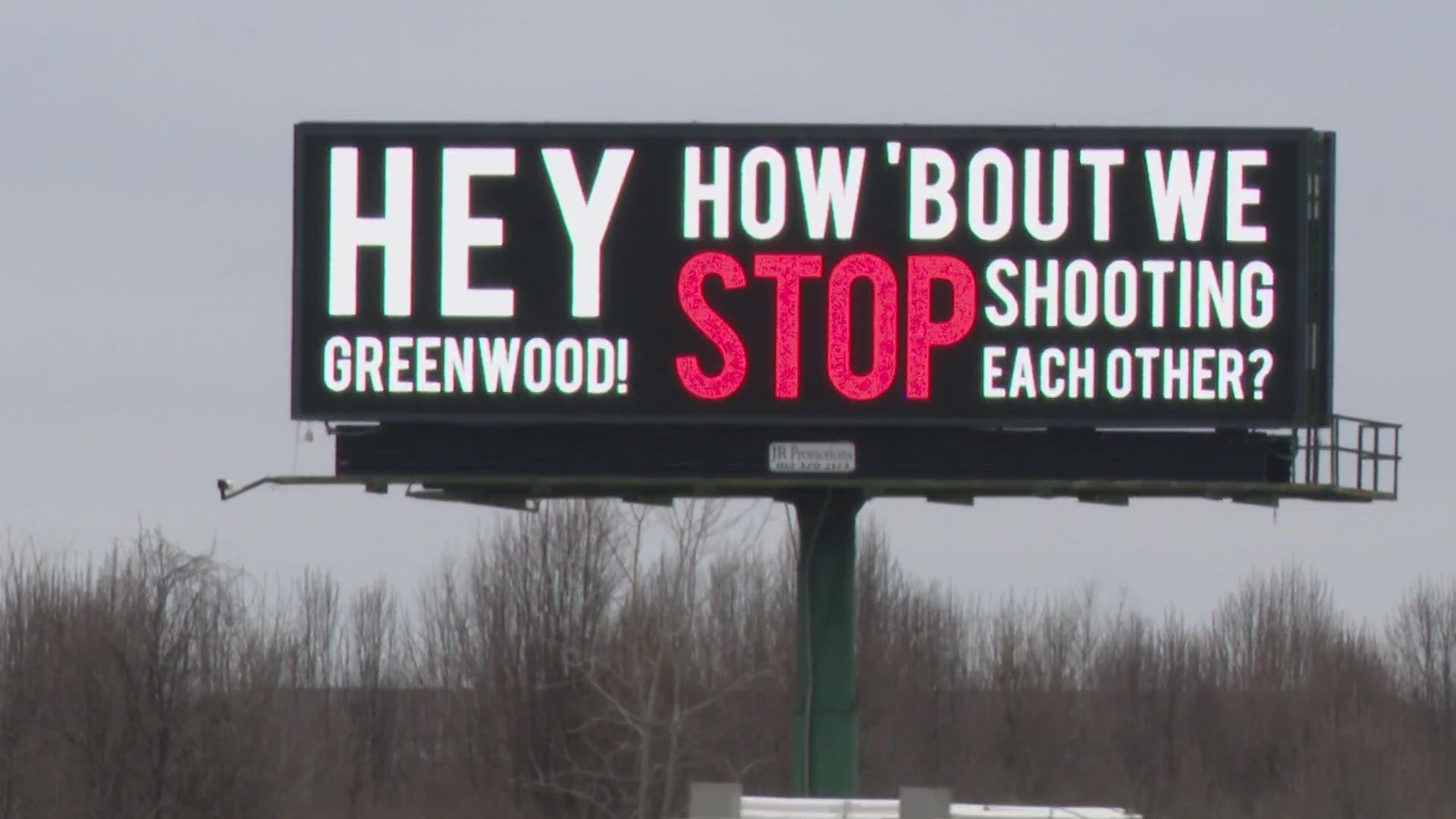 A billboard responding to a recent shooting in Greenwood got the attention of the city's mayor.