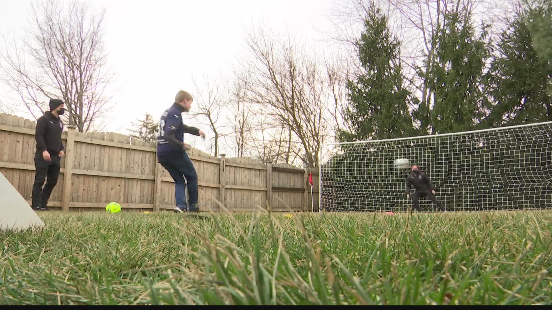 Indy Eleven and Make-A-Wish teamed up with the community to build a soccer field in Levi Kelley's backyard.