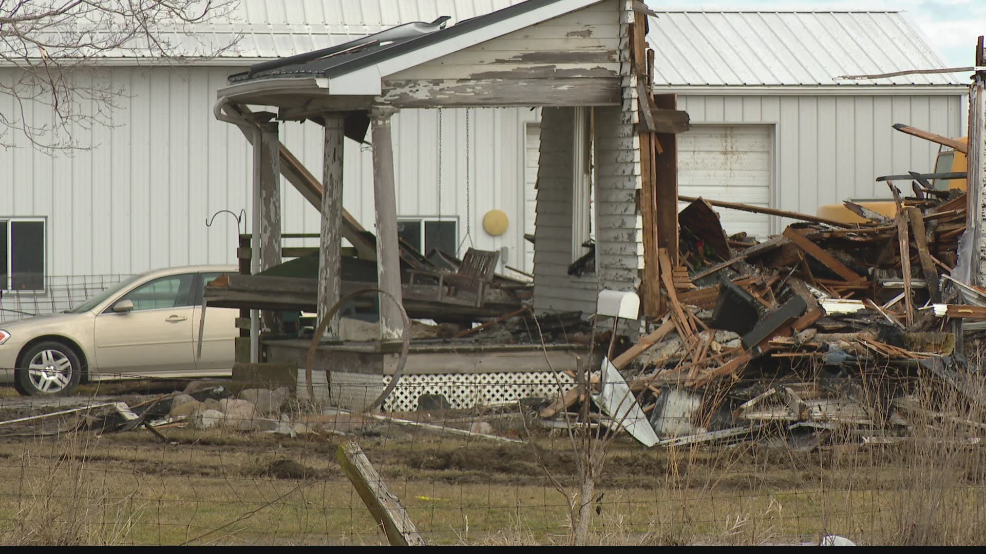 Firefighters were back at the home where three children were killed in a fire on Saturday morning.