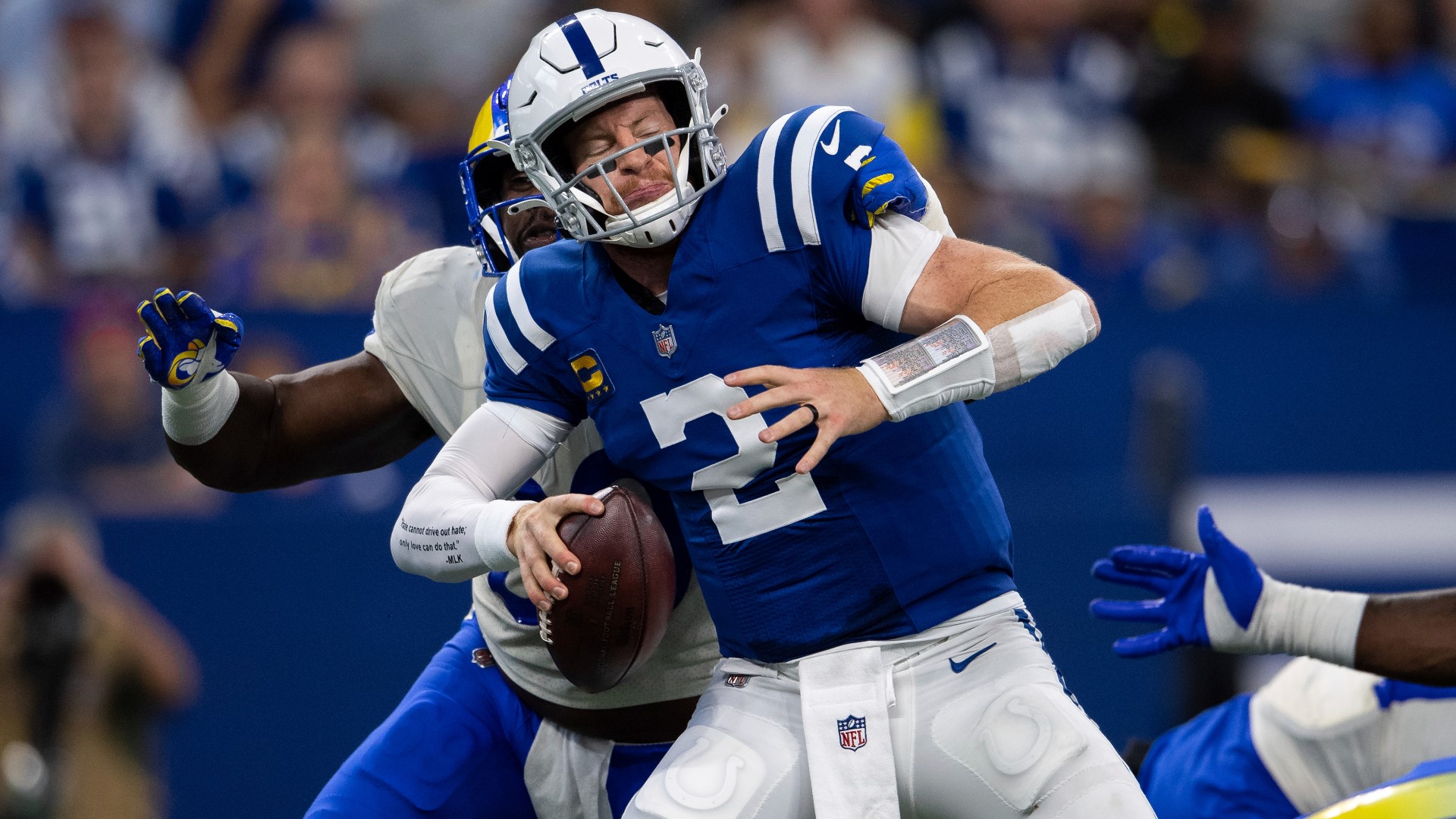 Colts head coach Frank Reich said quarterback Carson Wentz injured both of his ankles in Sunday's loss to the Los Angeles Rams.