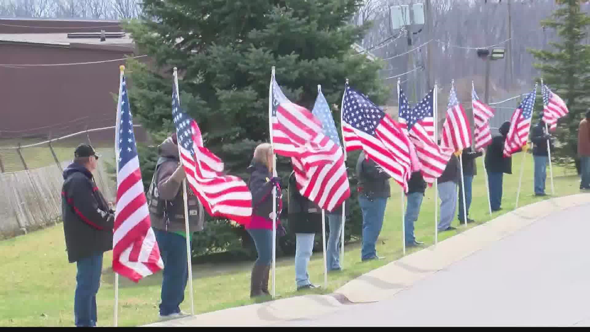 There was a solemn procession Saturday for a fallen Marine's final journey back home to Indiana. Friends, family and strangers lined the route in Fort Wayne.