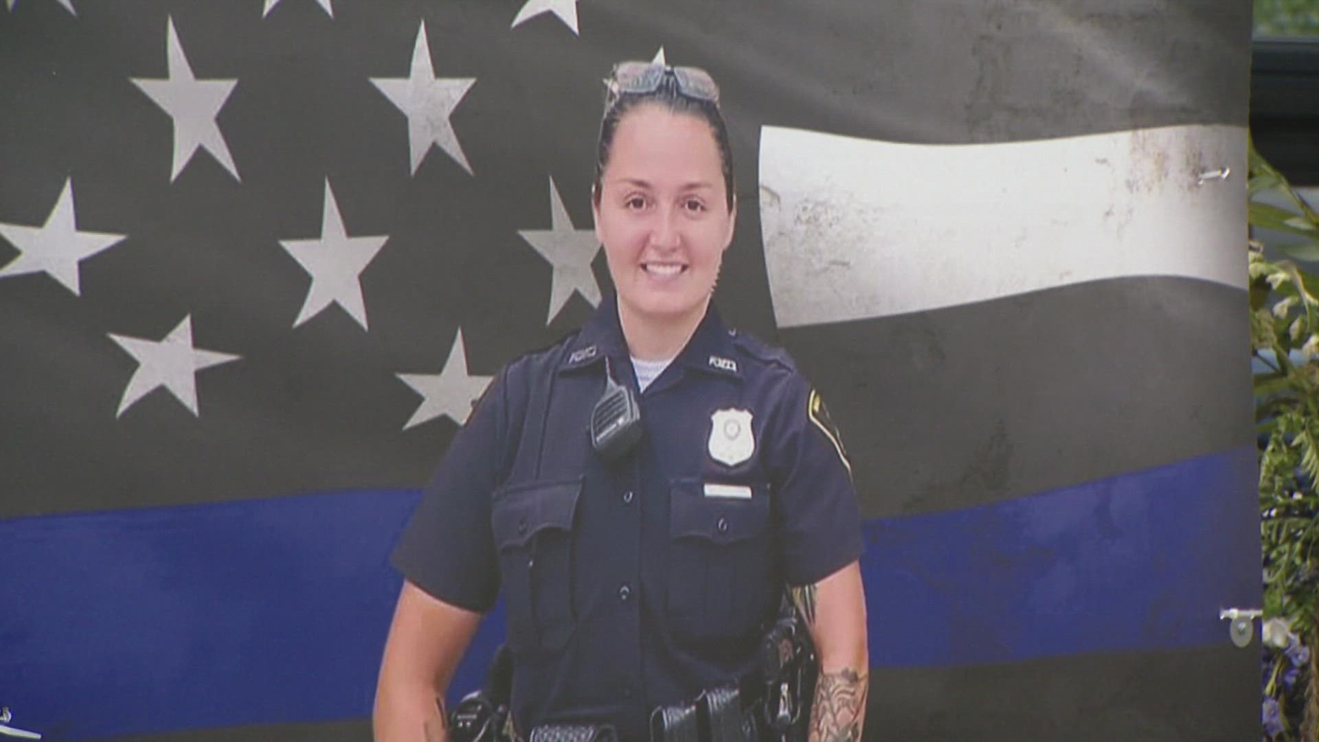 Family, friends and fellow officers are saying goodbye to Richmond Officer Seara Burton at a burial service at Crown Hill Cemetery.