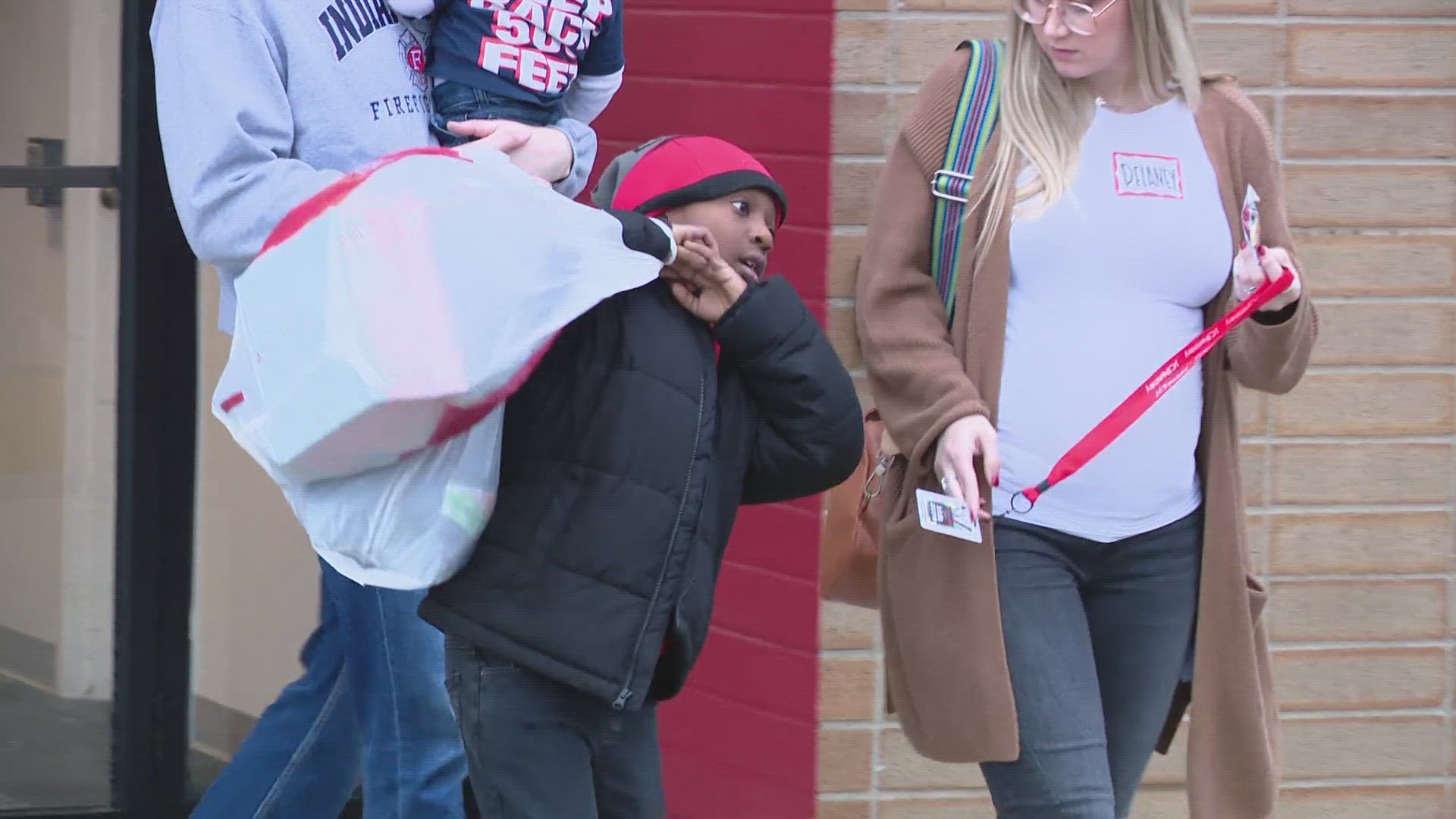 Kids spend the day inside the Greenwood JC Penny with firefighters and their families shopping for a brand-new wardrobe.