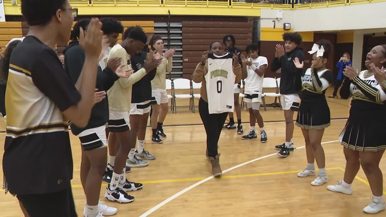 Purdue Polytechnic student honored during basketball game