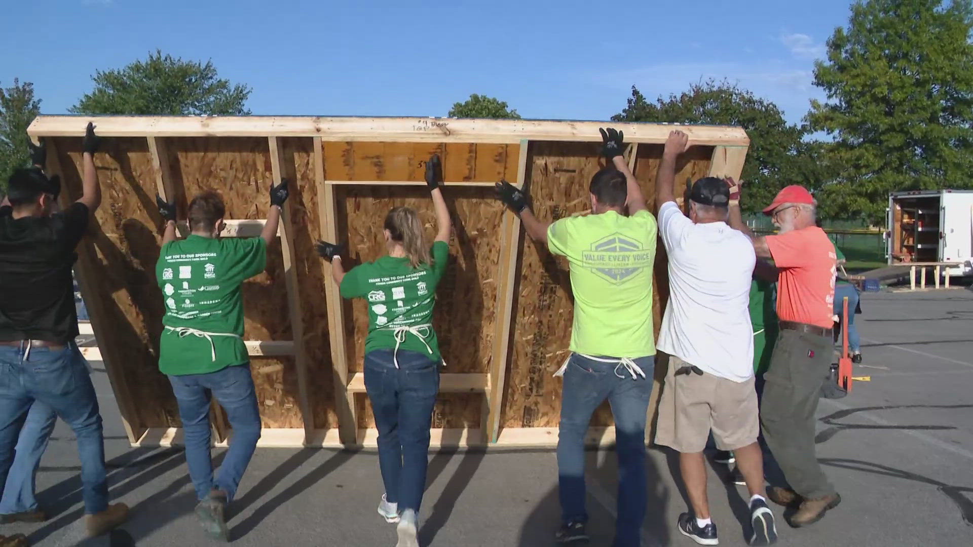 Nearly 100 volunteers and community partners assembled the exterior and interior wall panels for a future home at Holland Park in Fishers.