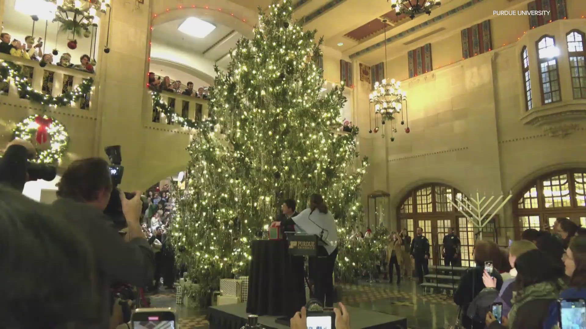 The 32-foot spruce was lighted during a recent ceremony.