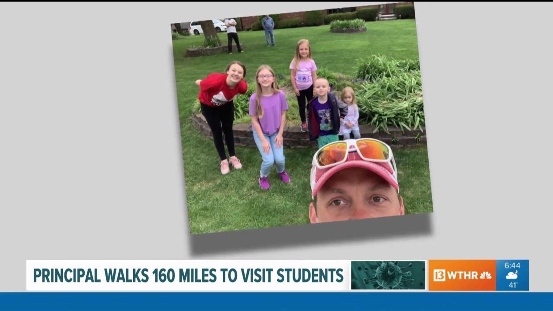 Principal walks 160 miles to visit students