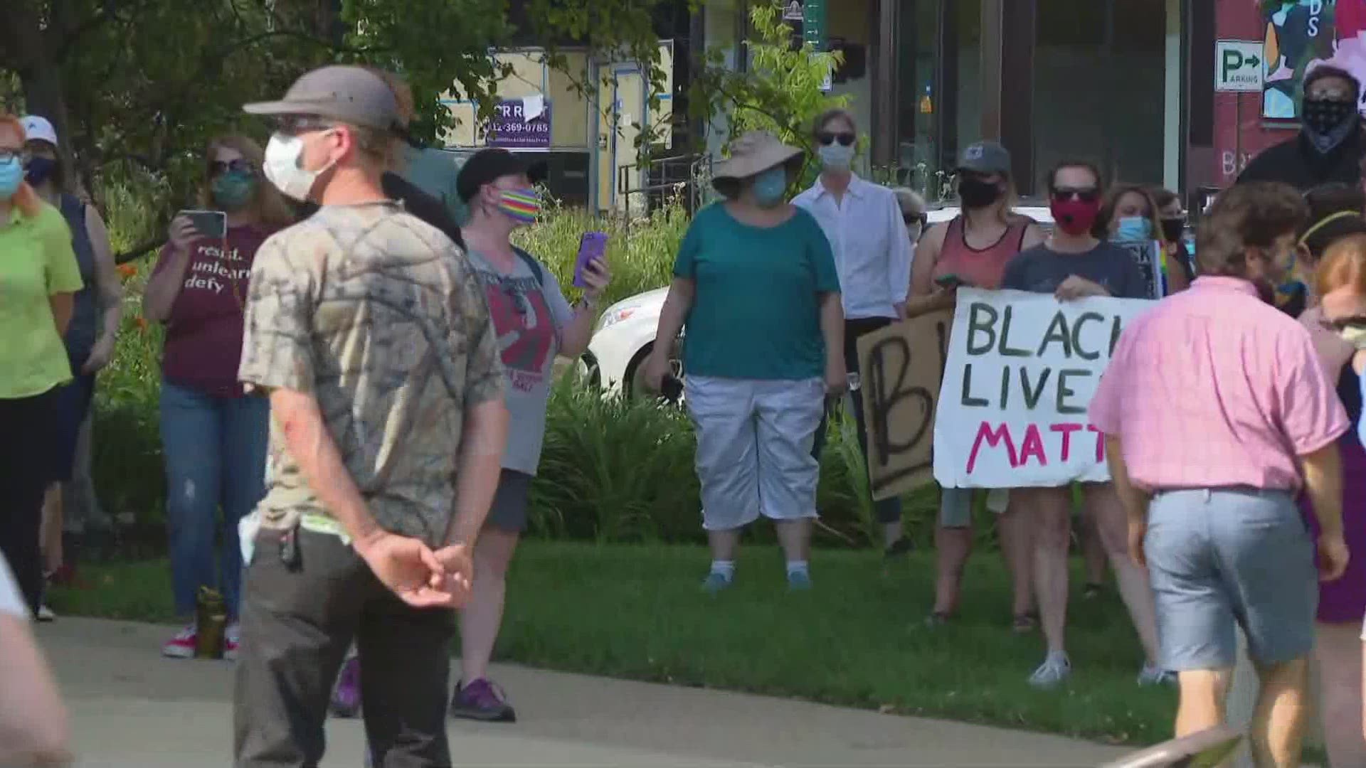 Protesters in Bloomington say they want the men seen in that now viral video on social media held accountable for attacking Vauhxx Booker.