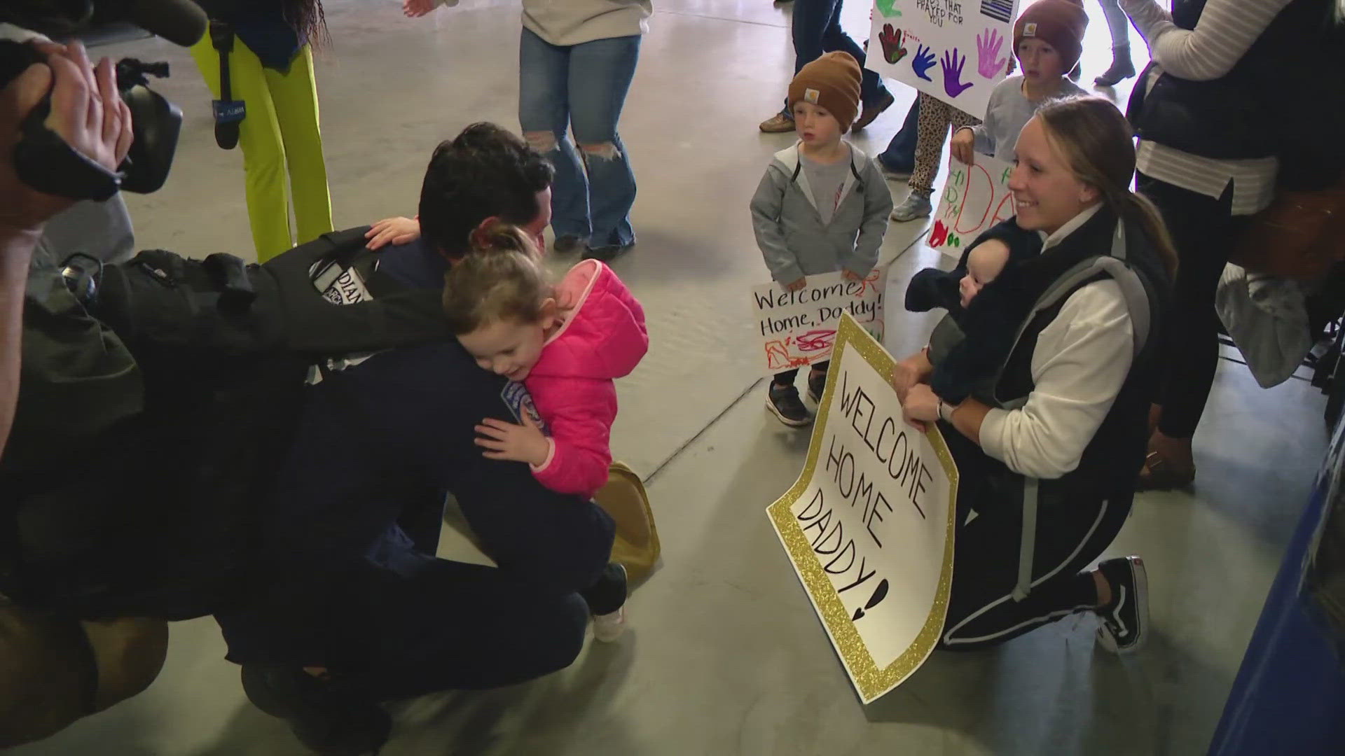 Members of Indiana Task Force 1 returned home to their families after a hurricane relief mission in the Southeast.