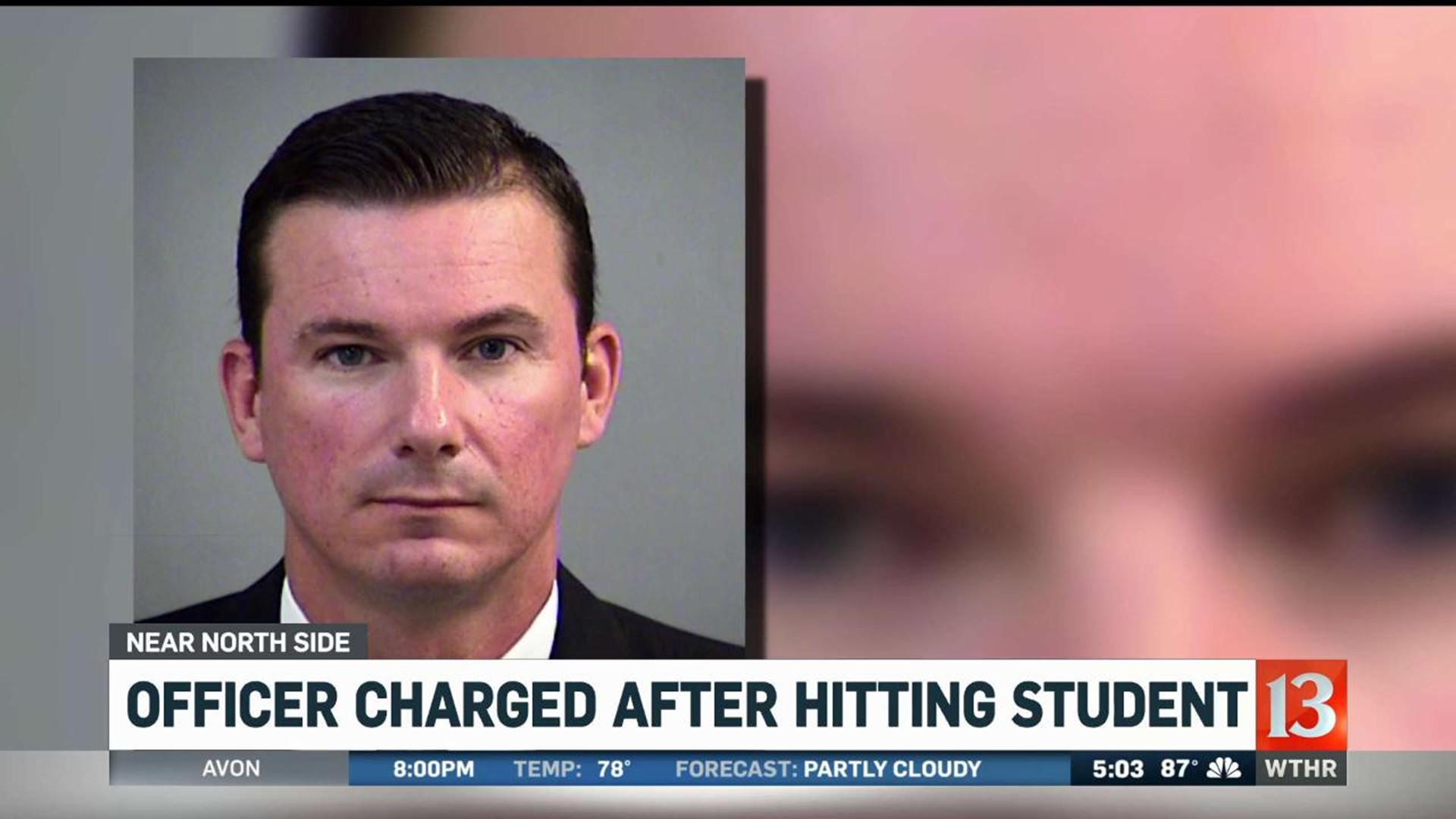 Officer charged after hitting student